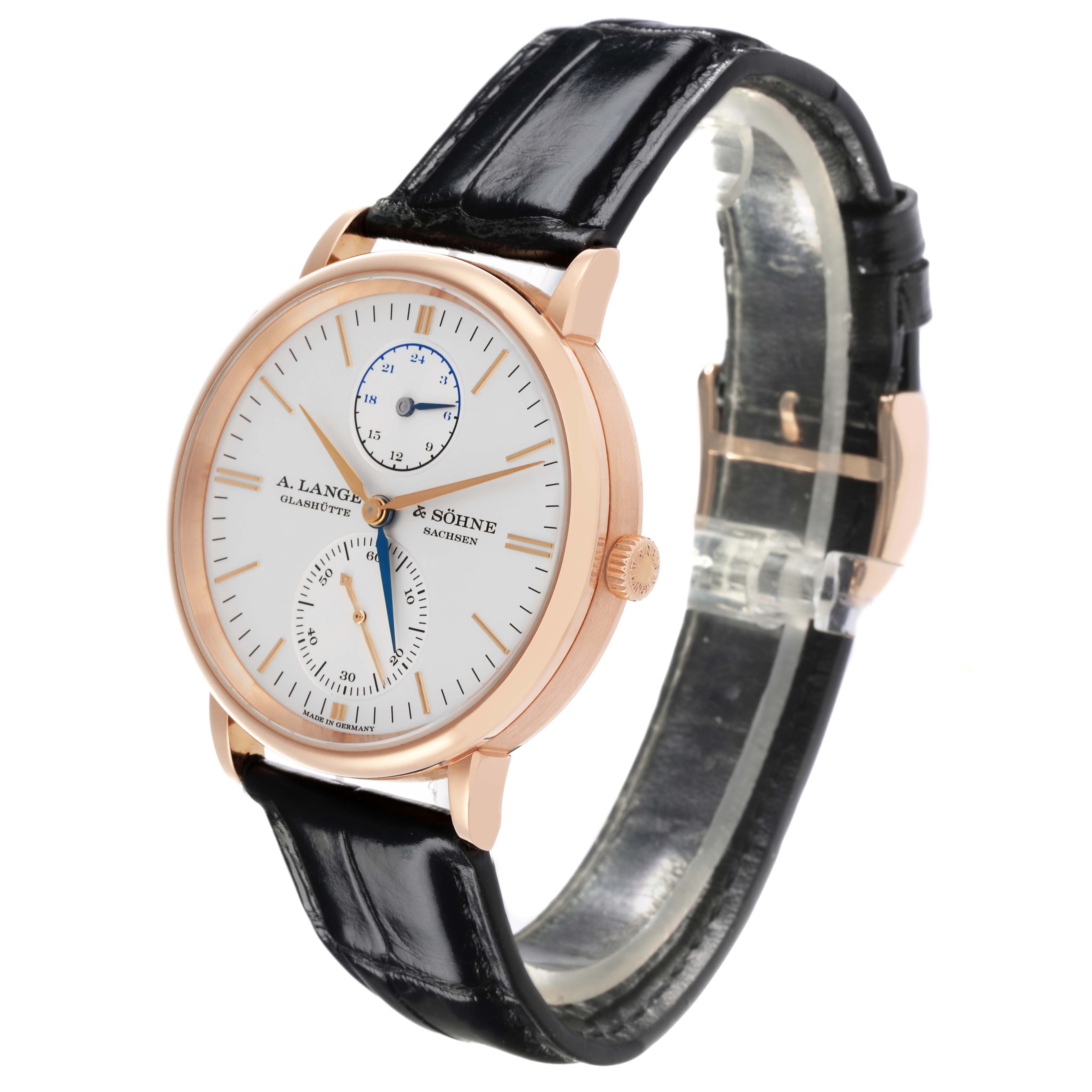 The A. Lange & Sohne Saxonia 386.032 Men's Rose Gold Silver Dial watch is shown at a slight angle, displaying its dial, case, crown, and leather strap.