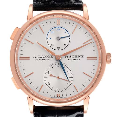 The A. Lange & Söhne Saxonia watch is shown from a top-down angle, highlighting the face, hands, and strap attachment.