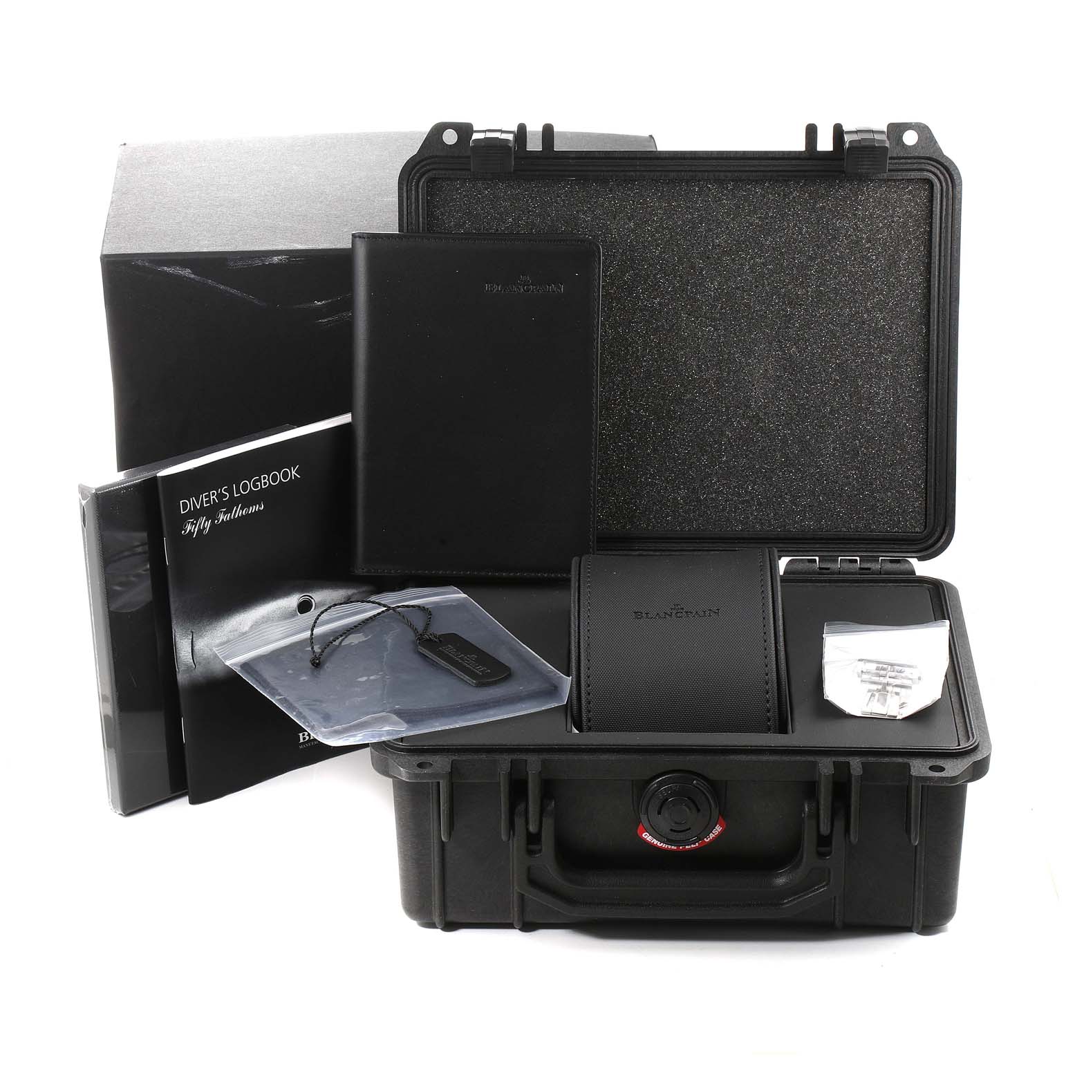 The image shows a Blancpain Fifty Fathoms 5100B-1110-B52A Men's Stainless Steel Grey Dial 5100B-1110-B52A Men's Stainless Steel Grey Dial watch case with accessories, logbook, and packaging from a front angle.