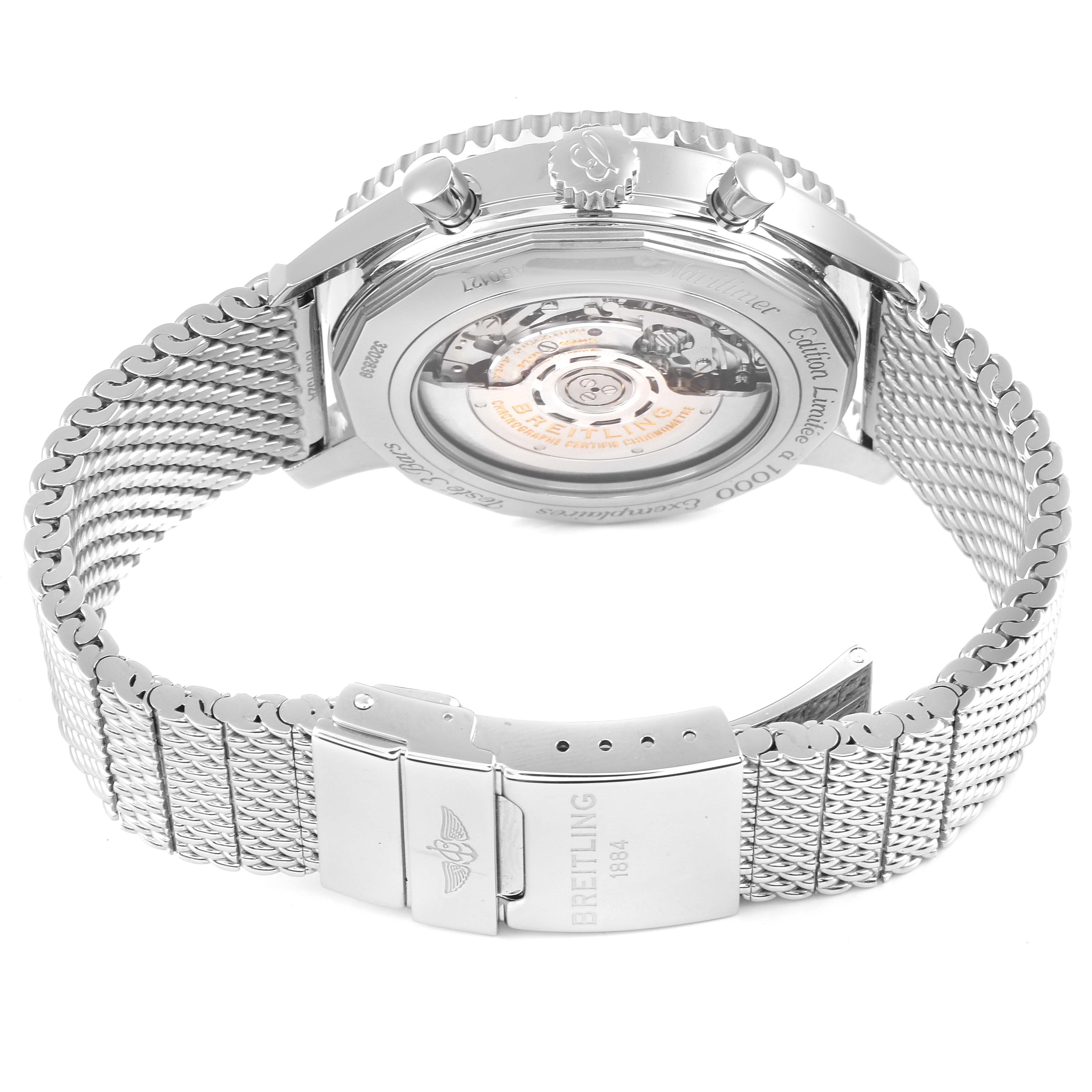 The image shows the back view of the Breitling Navitimer AB0127 Men's Stainless Steel Black Dial AB0127 Men's Stainless Steel Black Dial watch, featuring its case back, crown, pushers, and metal mesh bracelet.