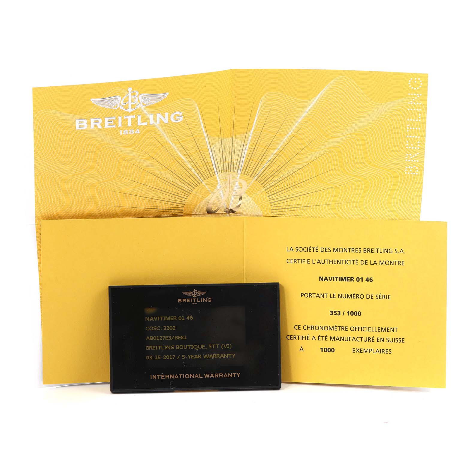 The image shows the international warranty card and authenticity certificate for the Navitimer model by Breitling.