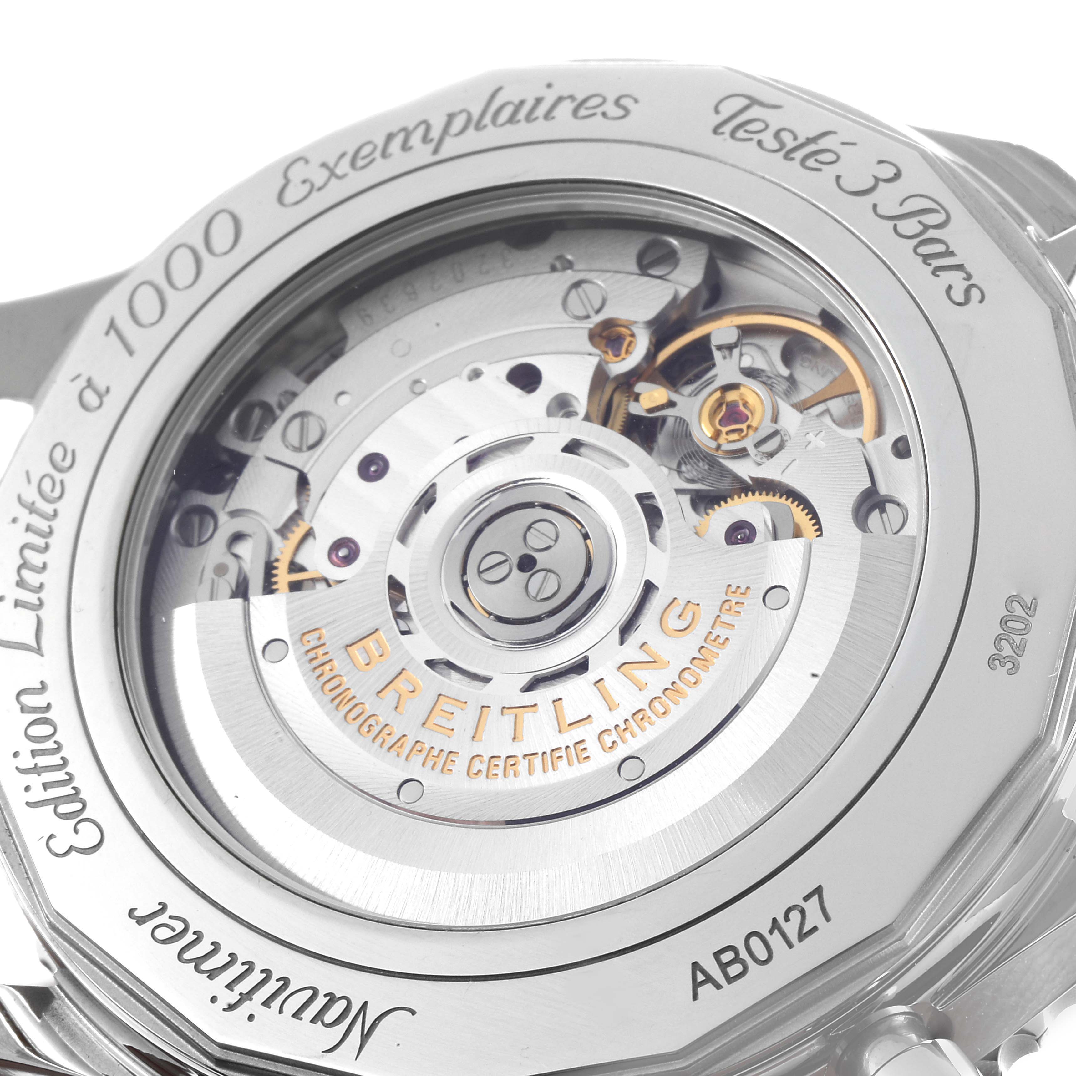 The image shows the backside of a Breitling Navitimer AB0127 Men's Stainless Steel Black Dial AB0127 Men's Stainless Steel Black Dial watch, highlighting its intricate mechanical movement and limited edition details.