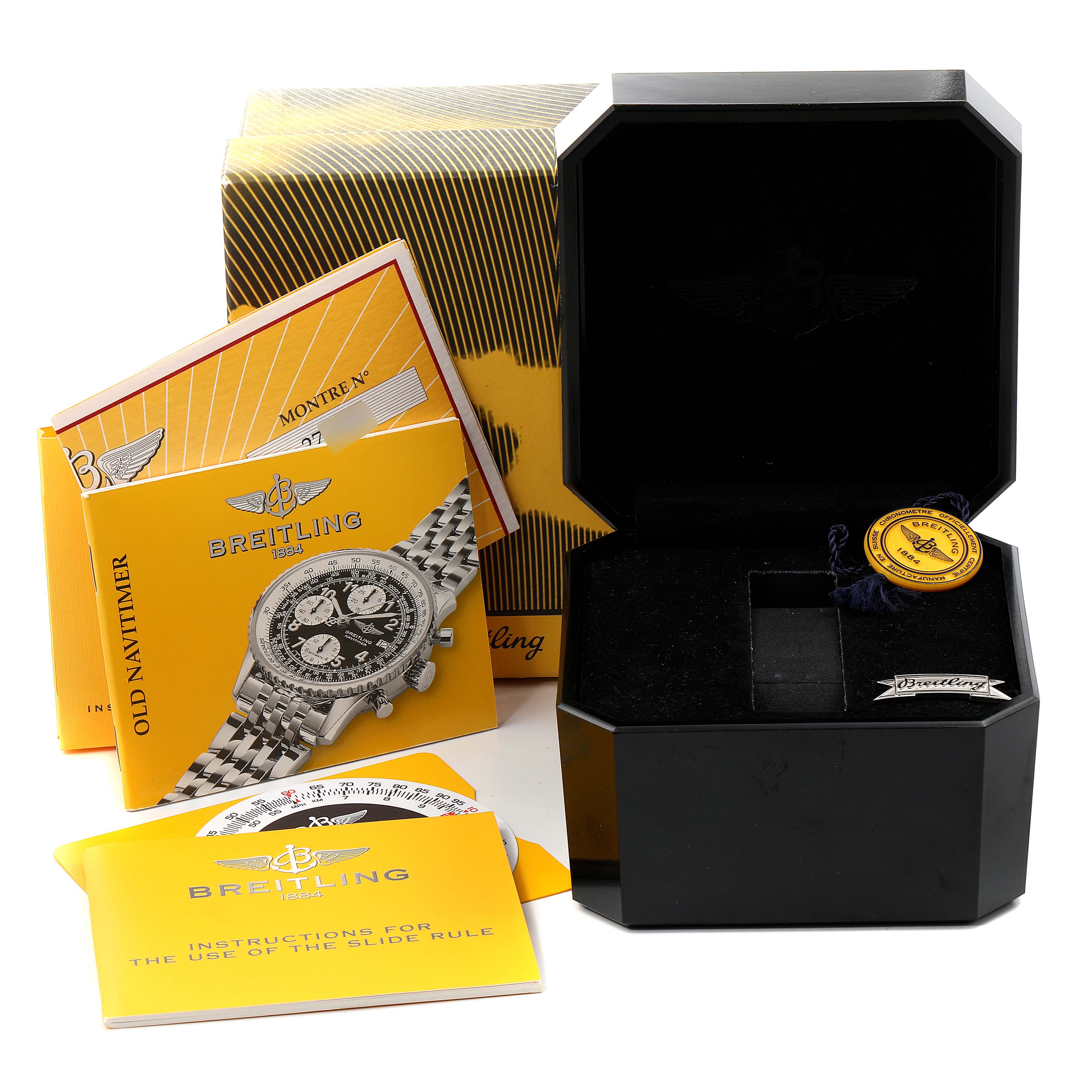 The image shows Breitling Navitimer A13322 Men's Stainless Steel Blue Dial A13322 Men's Stainless Steel Blue Dial packaging, manuals, hang tag, and an empty watch box at an angle.