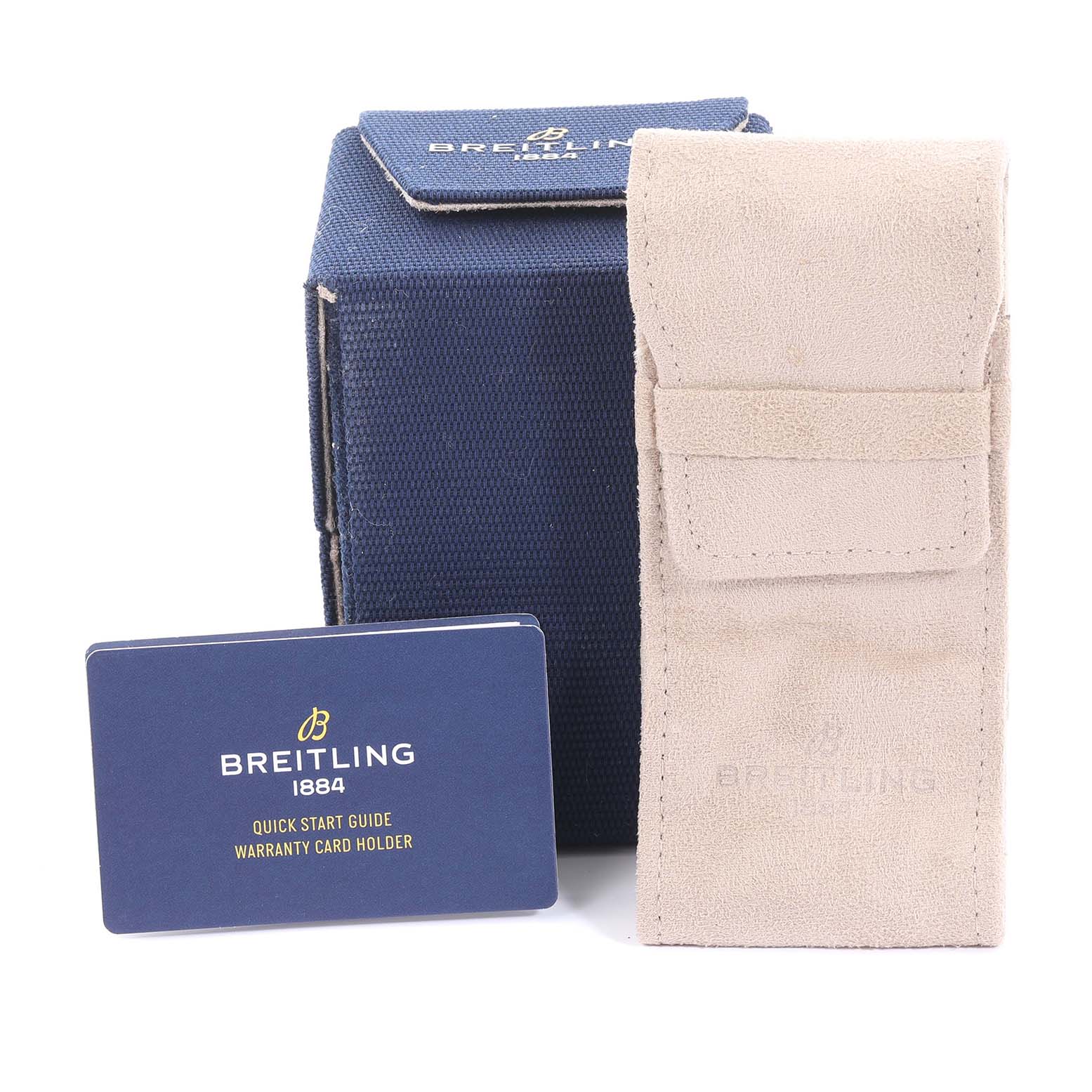 The image shows the packaging, a suede pouch, and a warranty card holder for the Breitling Limited Series model.
