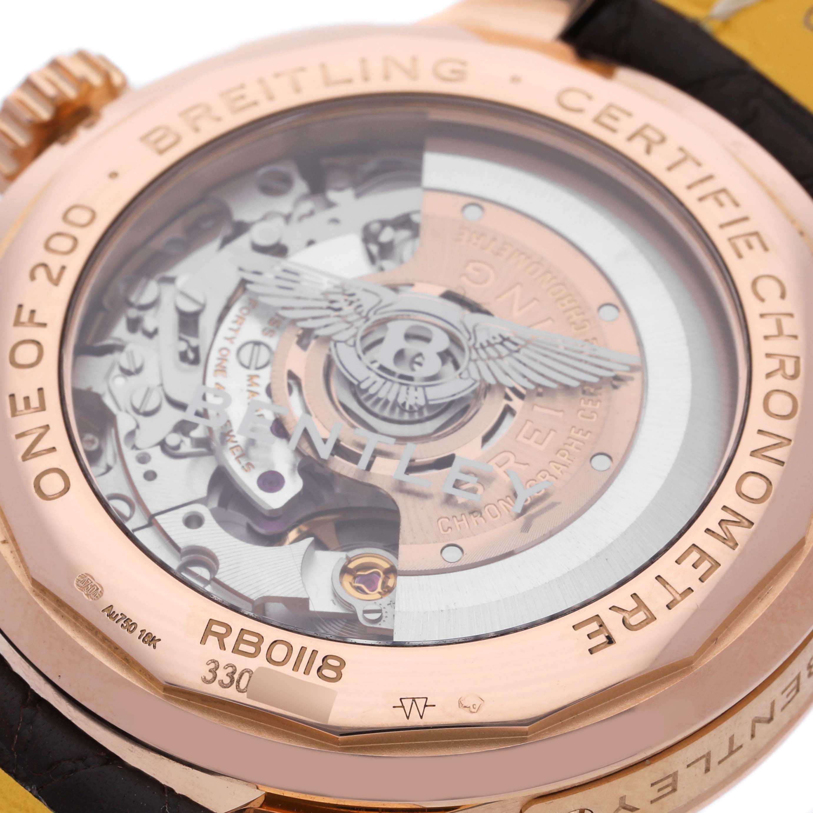 The image shows the back of the Breitling Limited Series watch, highlighting its intricate movement and engravings.