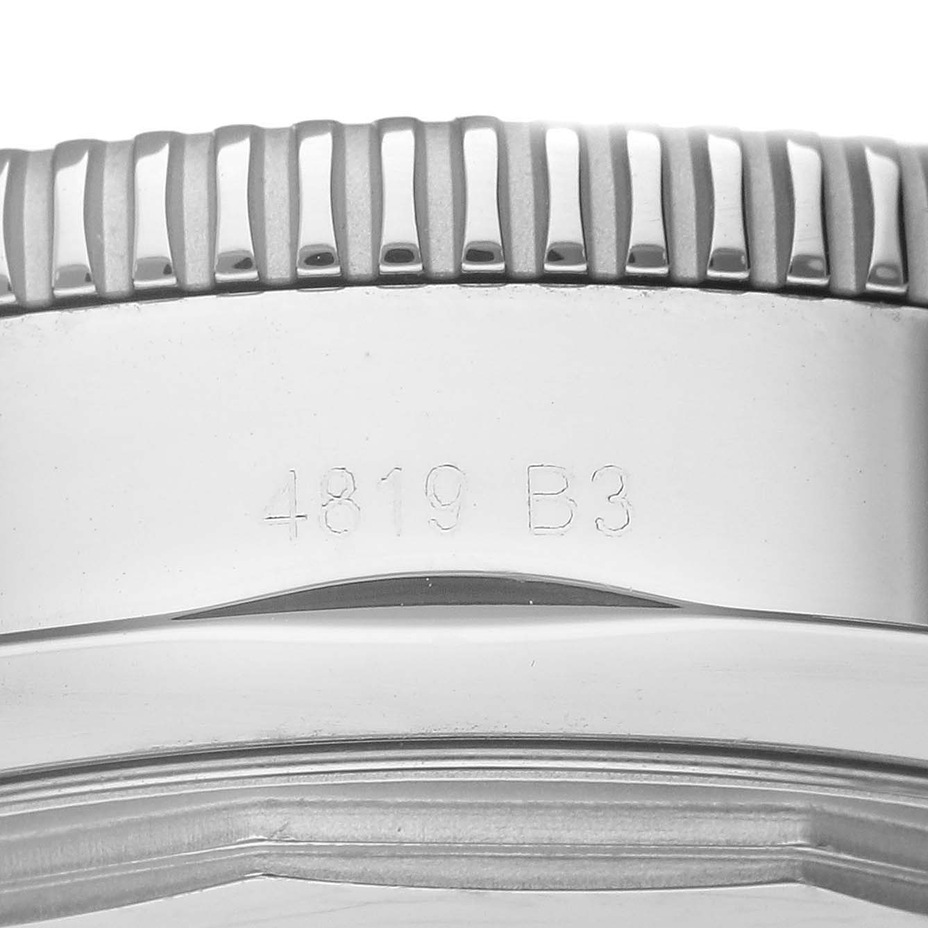 The image shows a close-up side view of the case and part of the bezel of a Breitling Superocean AB2020 Men's Stainless Steel Black Dial AB2020 Men's Stainless Steel Black Dial watch, displaying the serial number.