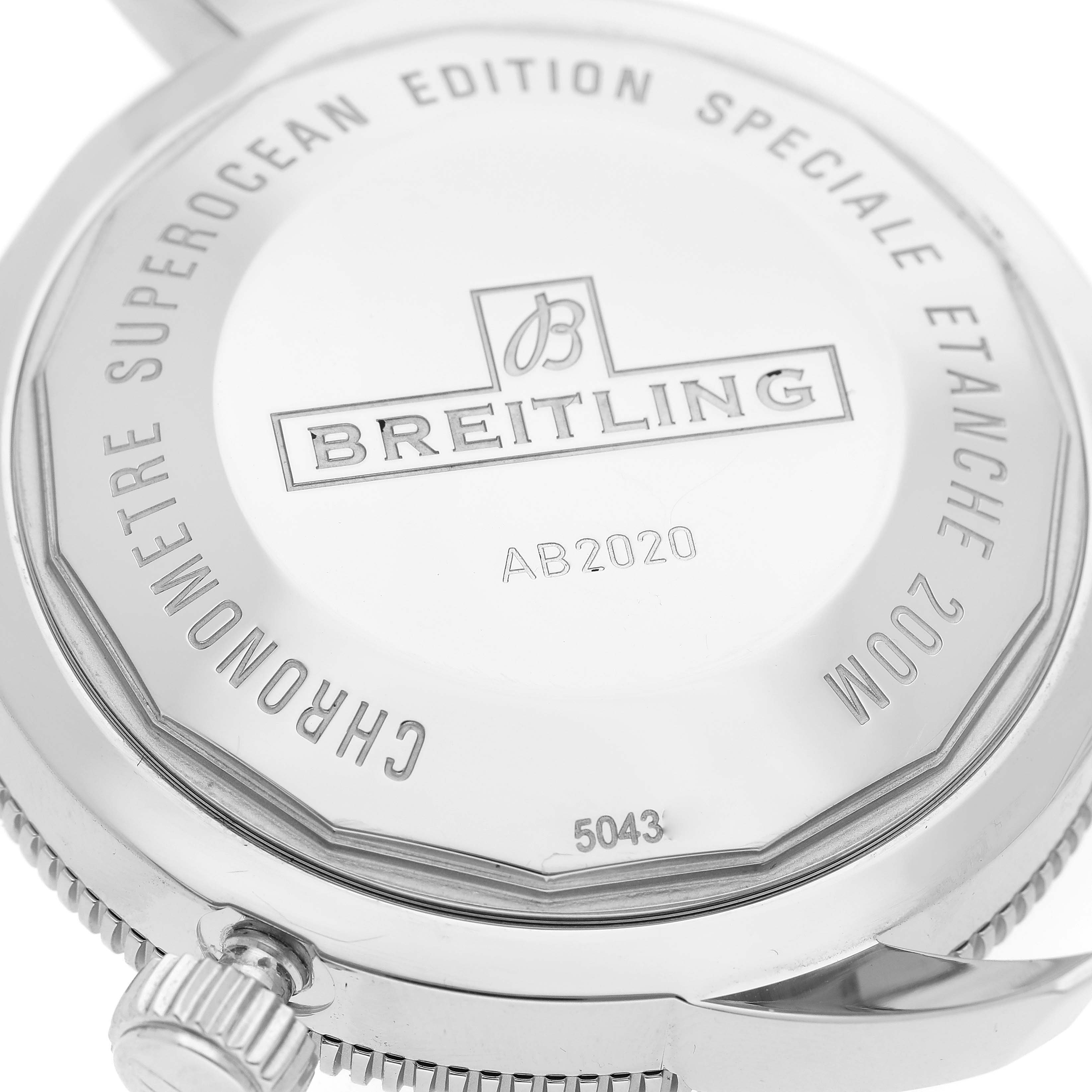 The image shows the back case and crown of a Breitling Superocean AB2020 Men's Stainless Steel Black Dial AB2020 Men's Stainless Steel Black Dial watch.