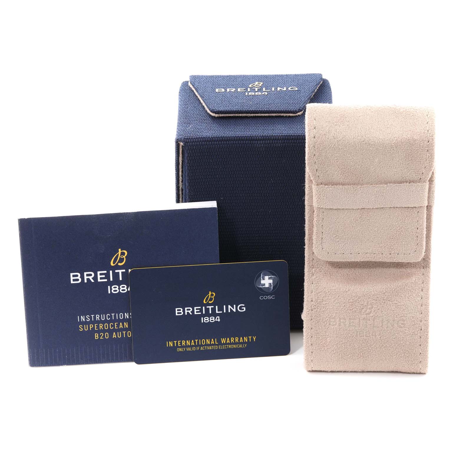 This image shows the packaging, instruction booklet, international warranty card, and a carrying pouch for a Breitling Superocean AB2020 Men's Stainless Steel Black Dial AB2020 Men's Stainless Steel Black Dial watch.