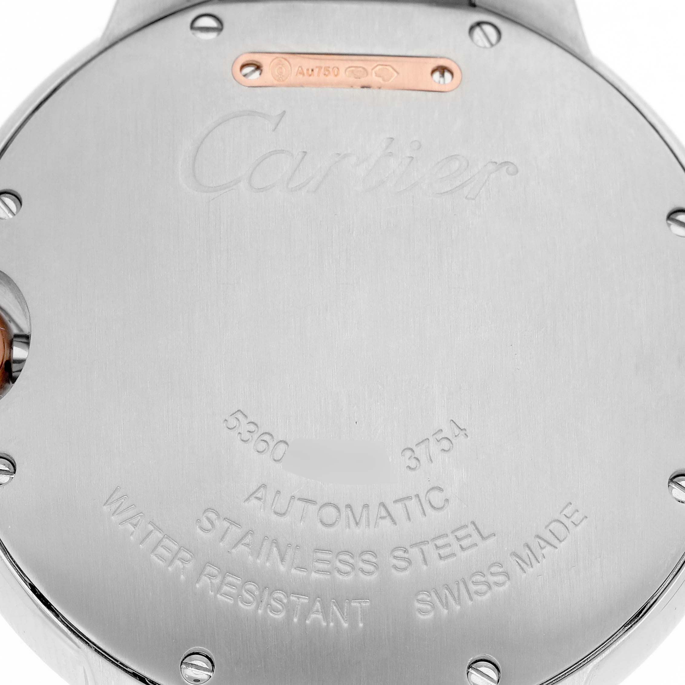 The image shows the back of the Cartier Ballon Bleu WE902081 Women's Steel and Gold (two tone) Silver Dial WE902081 Women's Steel and Gold (two tone) Silver Dial watch, featuring its engraved details and construction elements.