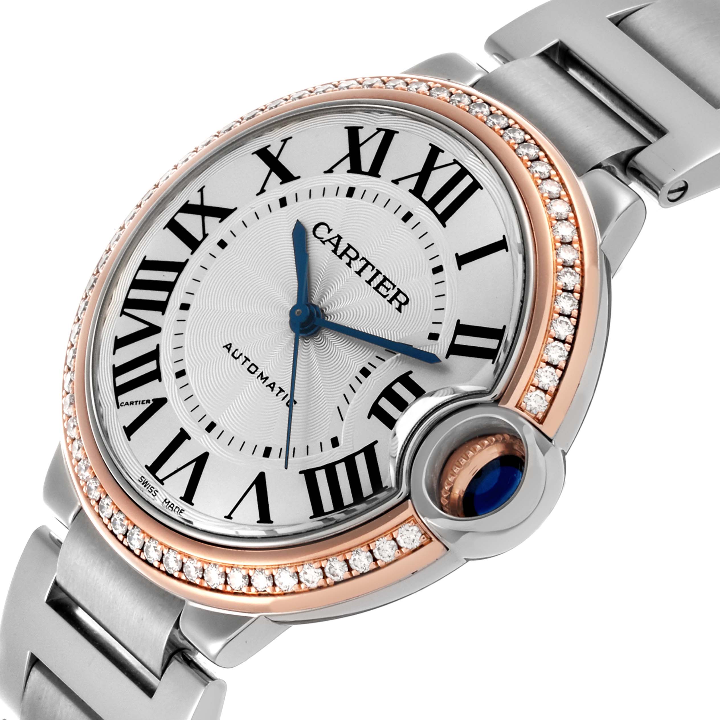 The Cartier Ballon Bleu WE902081 Women's Steel and Gold (two tone) Silver Dial WE902081 Women's Steel and Gold (two tone) Silver Dial watch is shown at an angle highlighting its face, bezel with diamonds, and part of the bracelet.