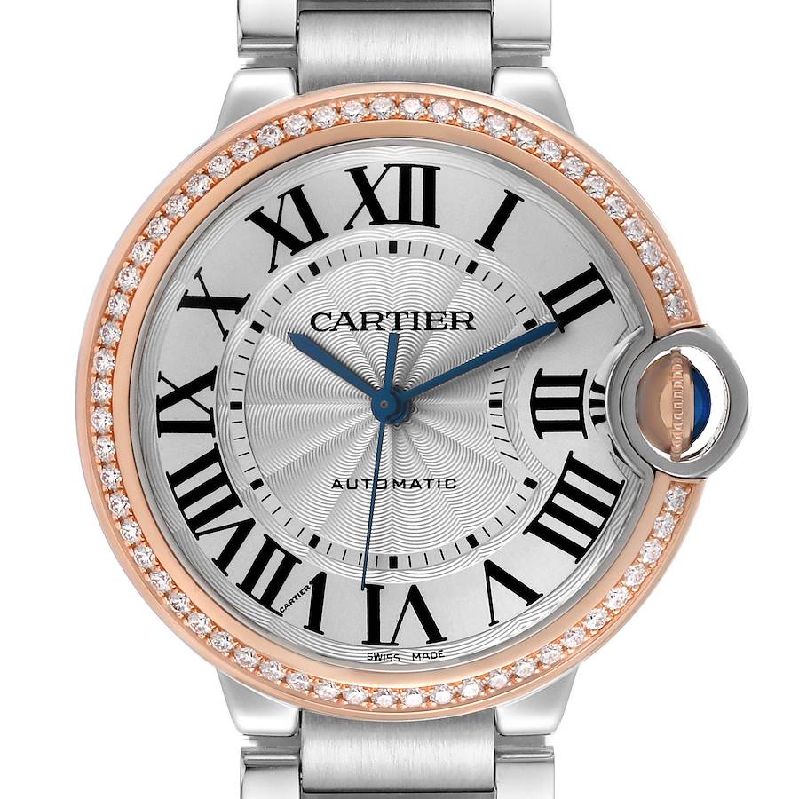 The Cartier Ballon Bleu watch is shown from a front angle, highlighting the face, bezel, and bracelet.