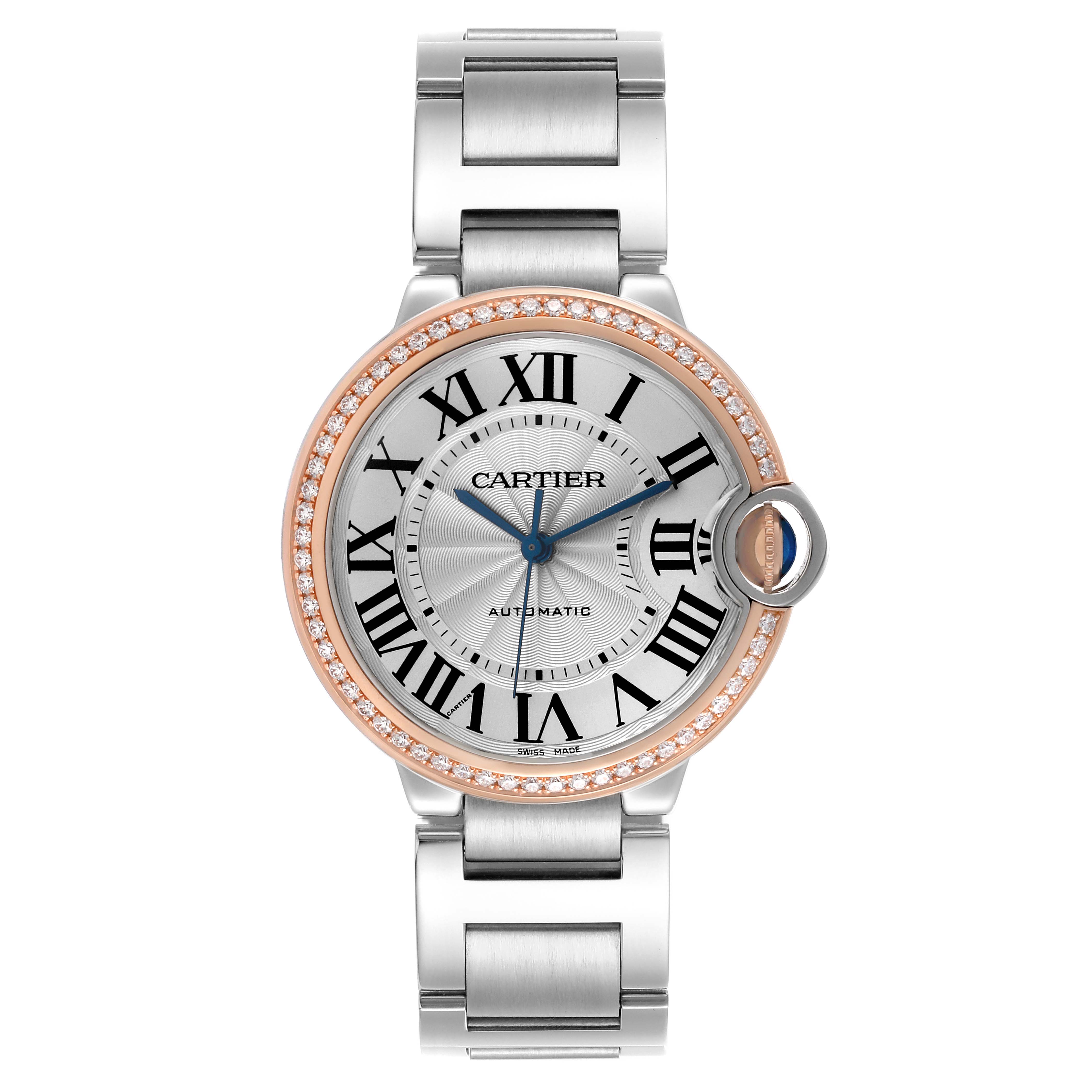 The Cartier Ballon Bleu WE902081 Women's Steel and Gold (two tone) Silver Dial WE902081 Women's Steel and Gold (two tone) Silver Dial watch is shown from a top-down angle displaying its face, Roman numerals, blue hands, and metal bracelet.
