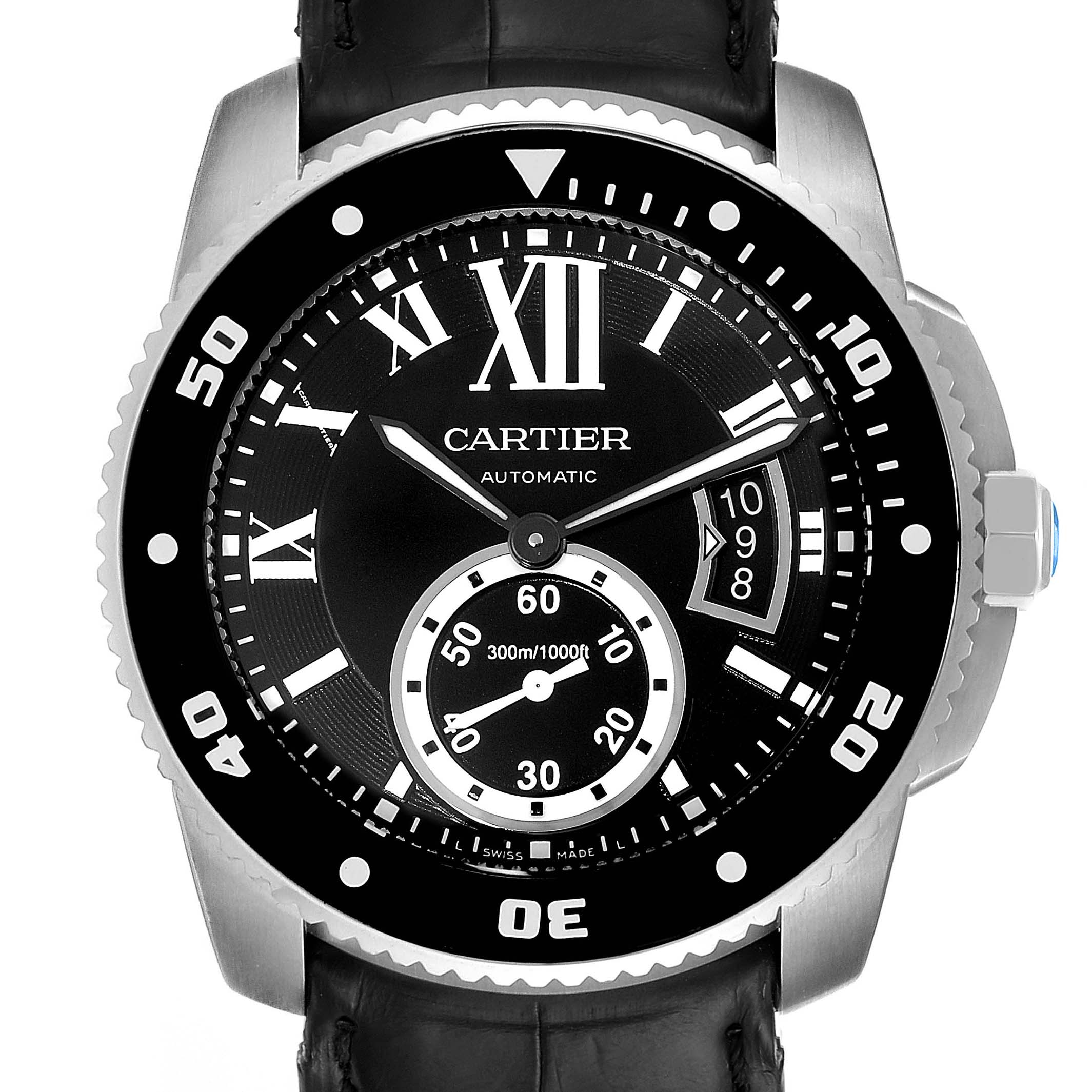 The image shows a front view of the Calibre de Cartier model by Cartier, featuring the dial, bezel, and crown.