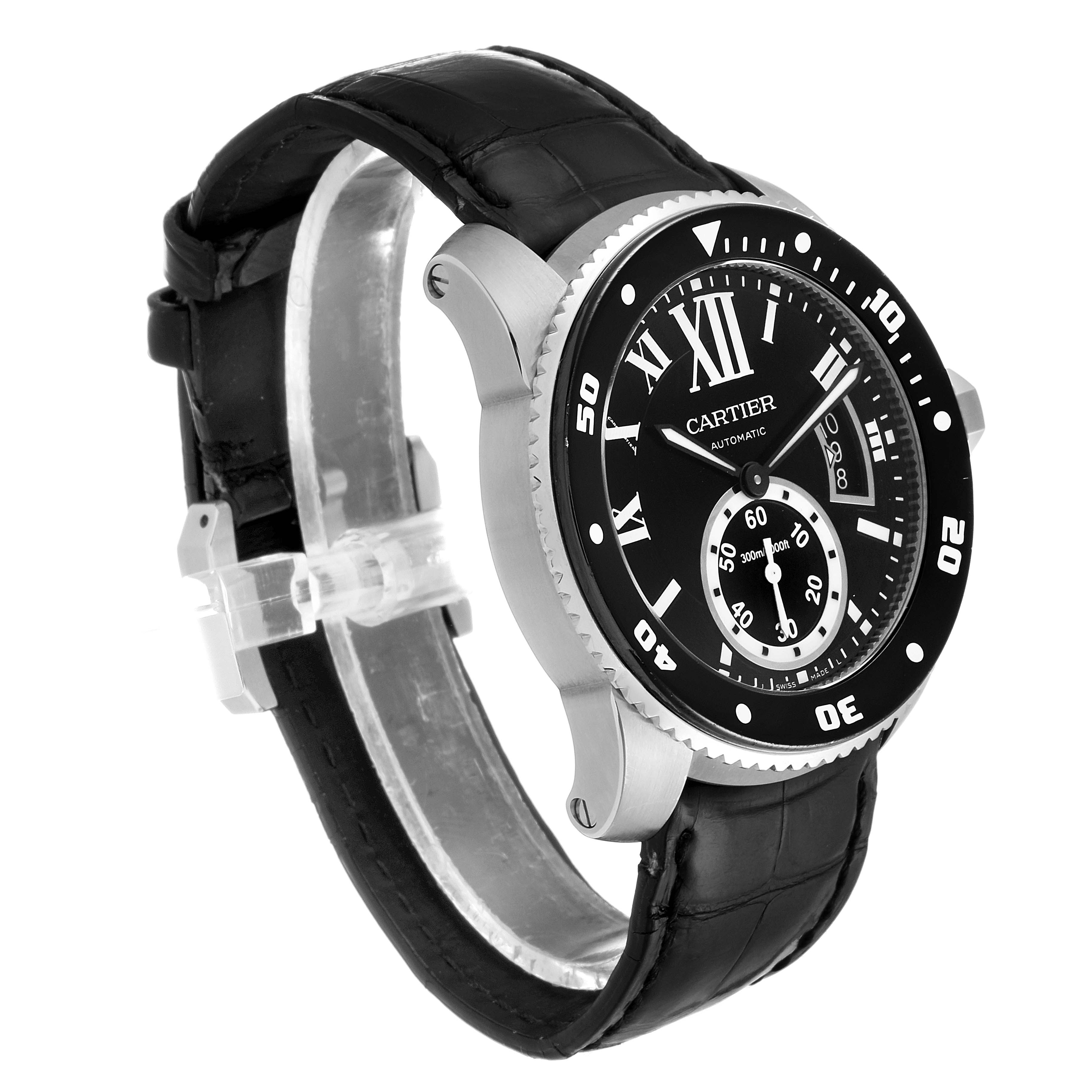 The Calibre de Cartier watch by Cartier is shown from a three-quarter angle, highlighting its black dial, bezel, and leather strap.