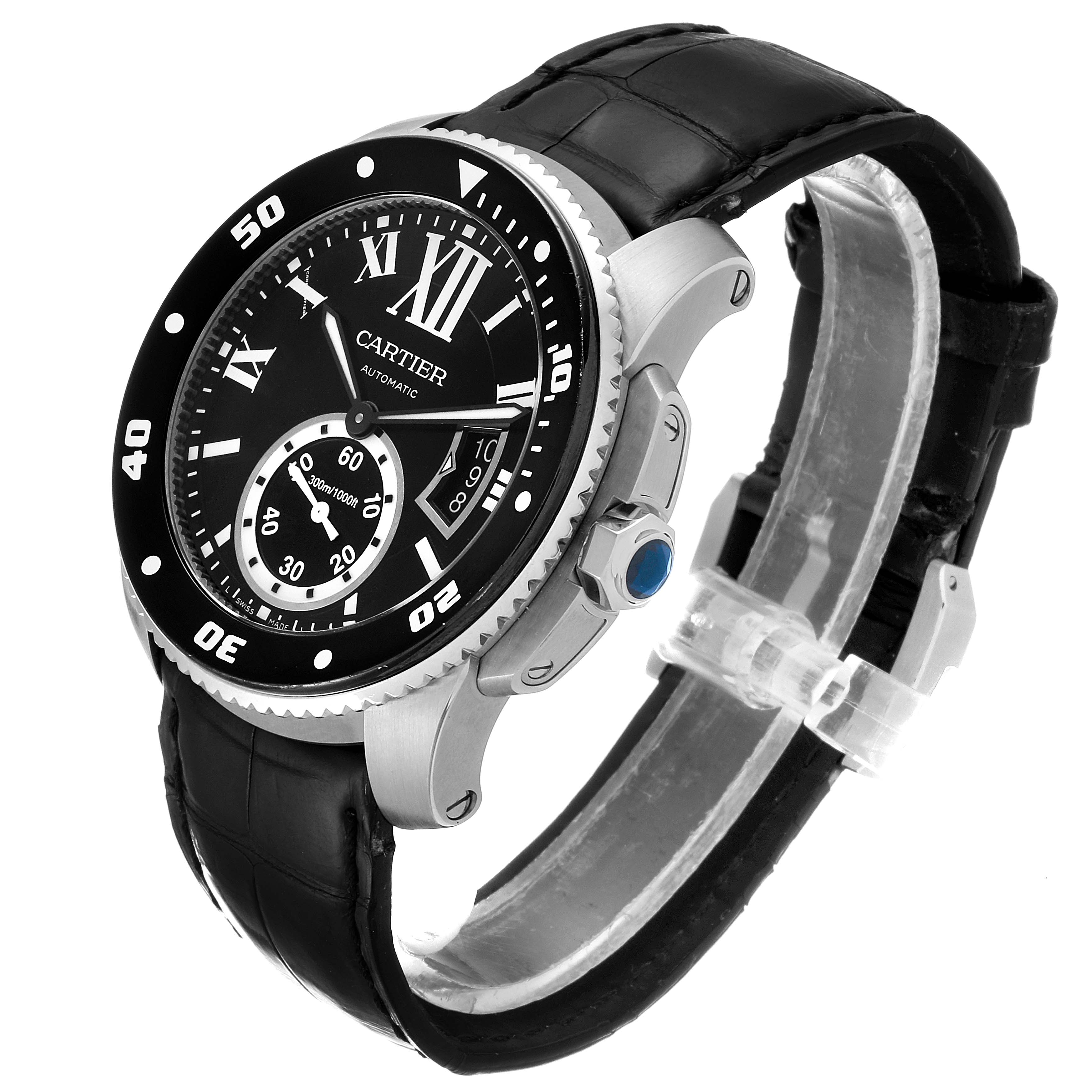The Calibre de Cartier watch by Cartier is shown at a three-quarter angle, highlighting the face, crown, and black leather strap.