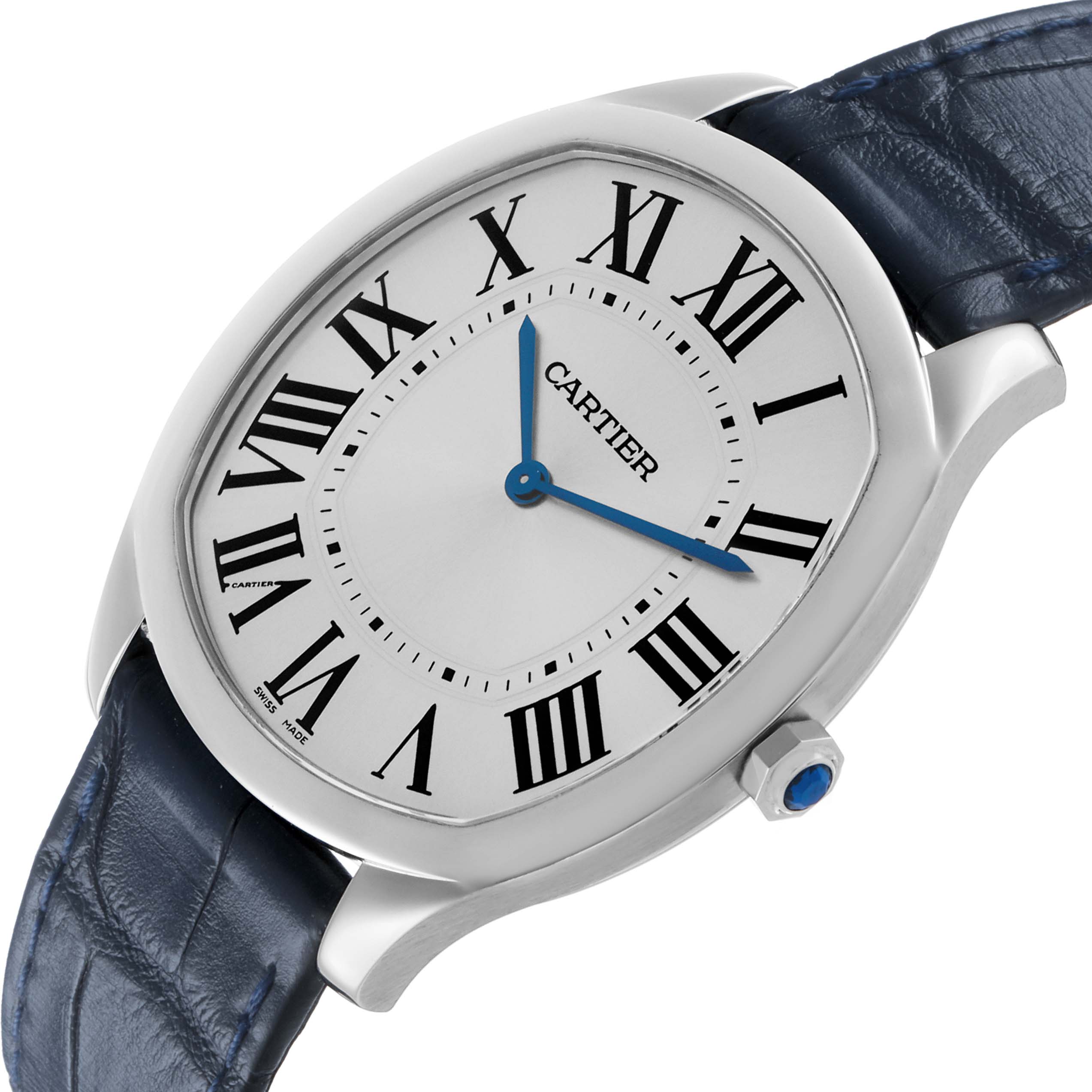 The Drive de Cartier watch is shown at an angle highlighting the face, crown with blue gemstone, and leather strap.