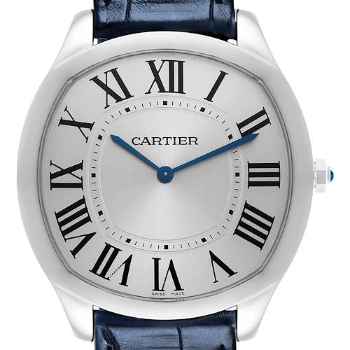The Drive de Cartier watch is shown from a front angle, featuring the dial, Roman numerals, blue hands, and a leather strap.