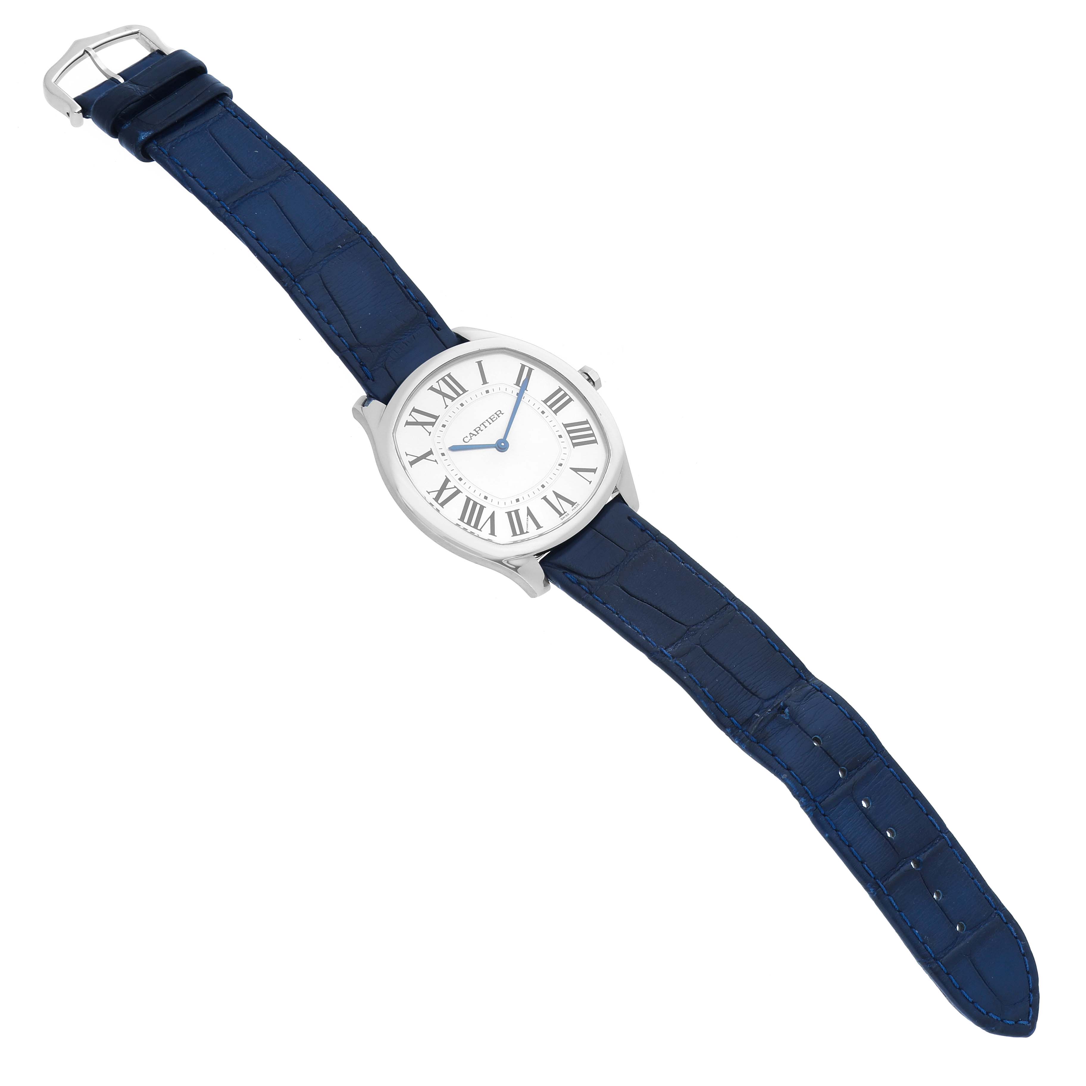 The Drive de Cartier watch is shown from a high angle, displaying the face and blue leather strap.