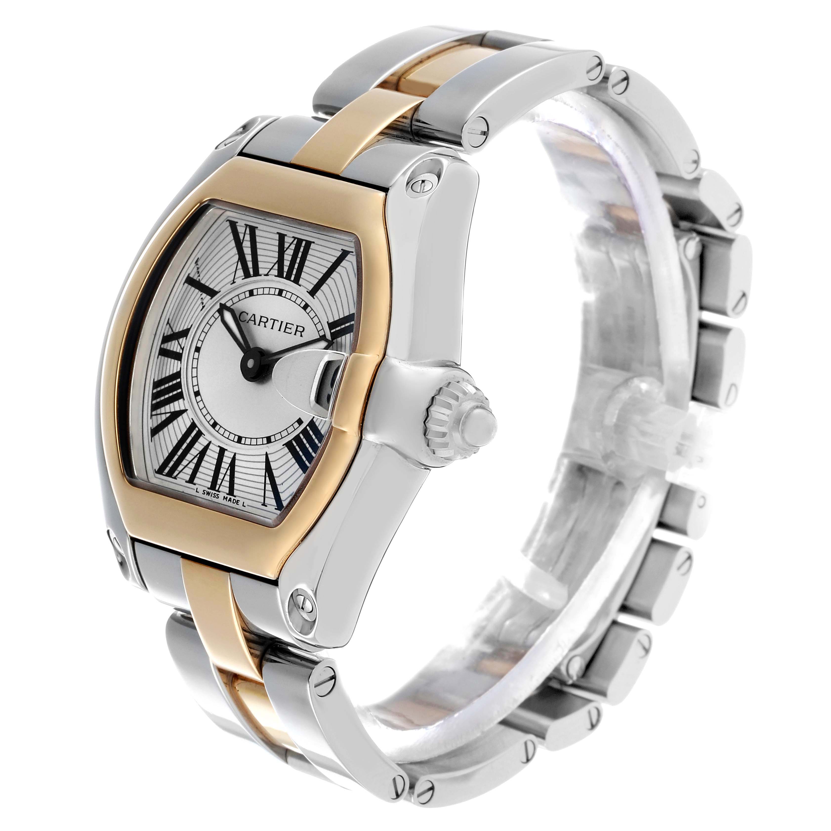 The Cartier Roadster W62026Y4 Women's Steel and Gold (two tone) Silver Dial watch is shown at a three-quarter angle, highlighting the dial, crown, and metal bracelet.