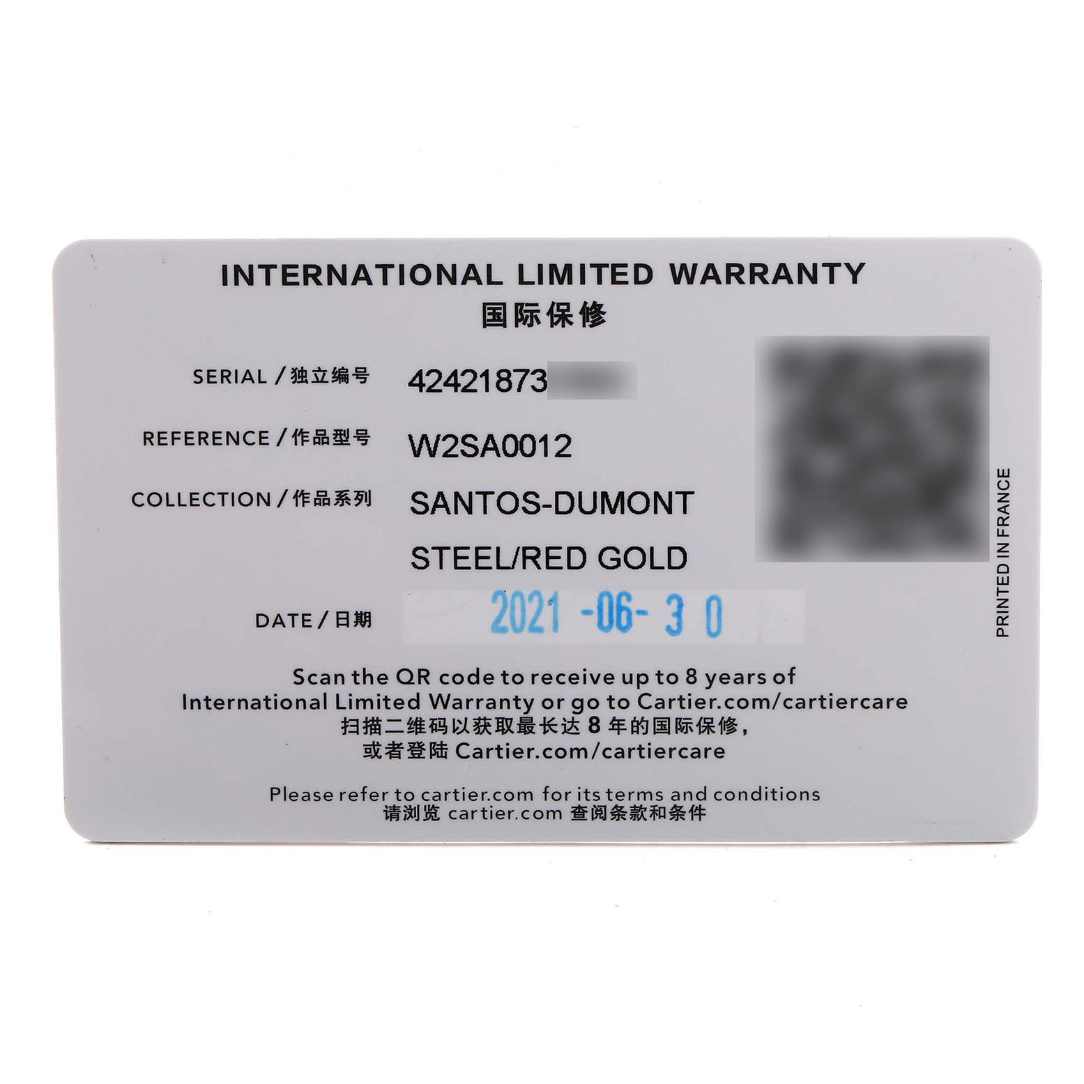 The image shows an international limited warranty card for the Cartier Santos W2SA0012 Women's Steel and Gold (two tone) Silver Dial-Dumont watch, detailed with model and warranty info.