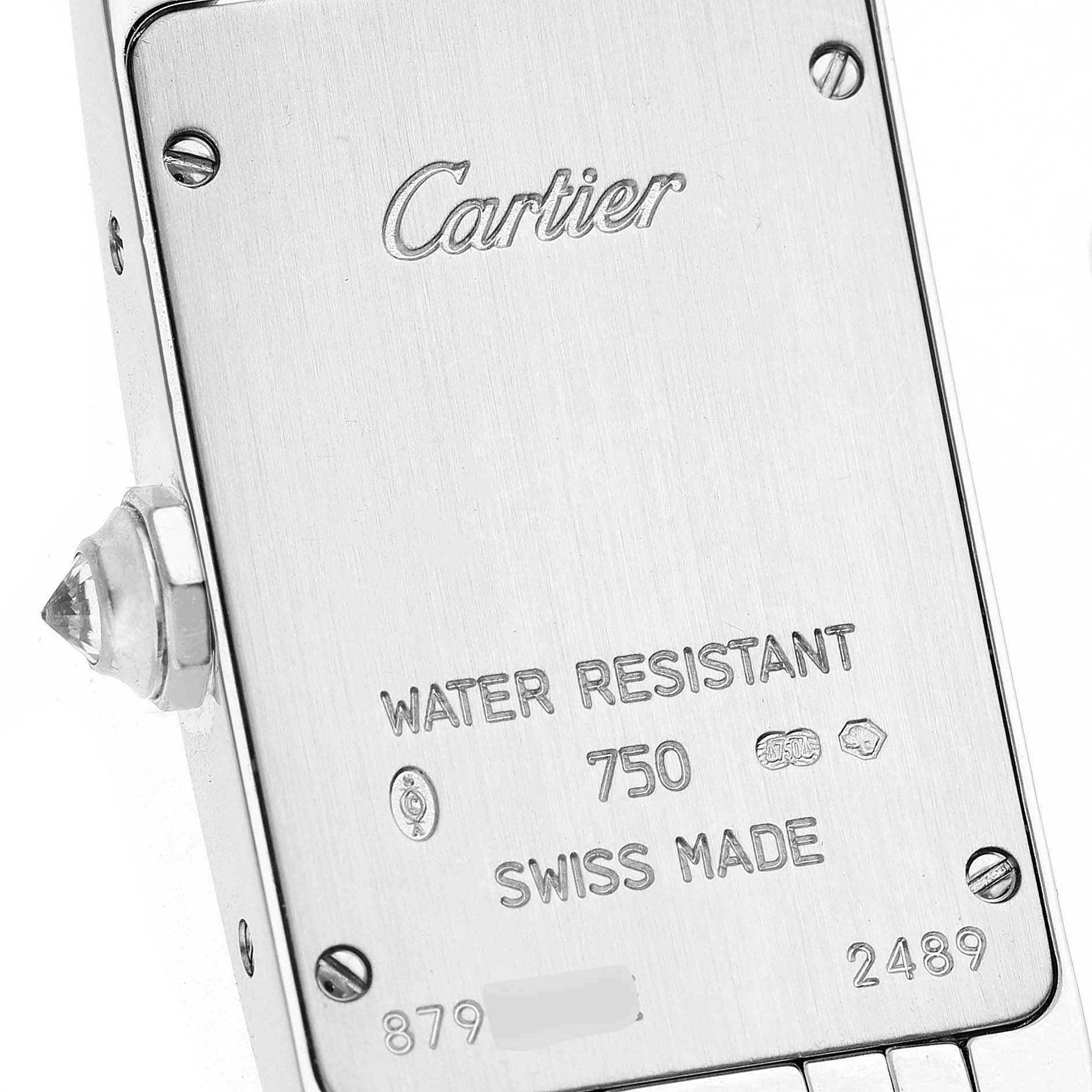 This image shows the back case and side crown of a Cartier Tank Americaine WB7073L1 Women's White Gold Silver Dial WB7073L1 Women's White Gold Silver Dial watch.