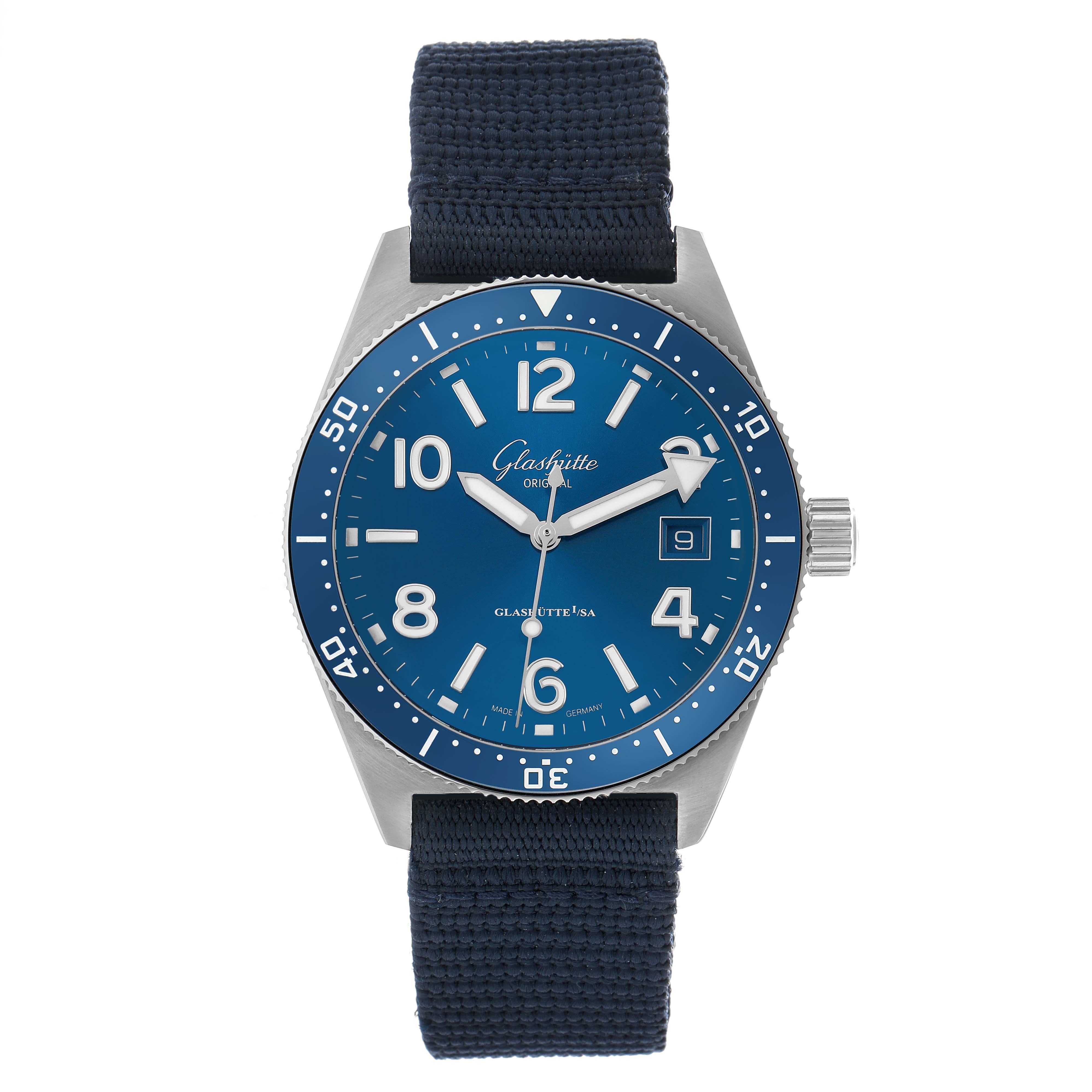 The Glashütte Original watch is shown from a front angle, displaying the blue dial, bezel, and fabric strap.