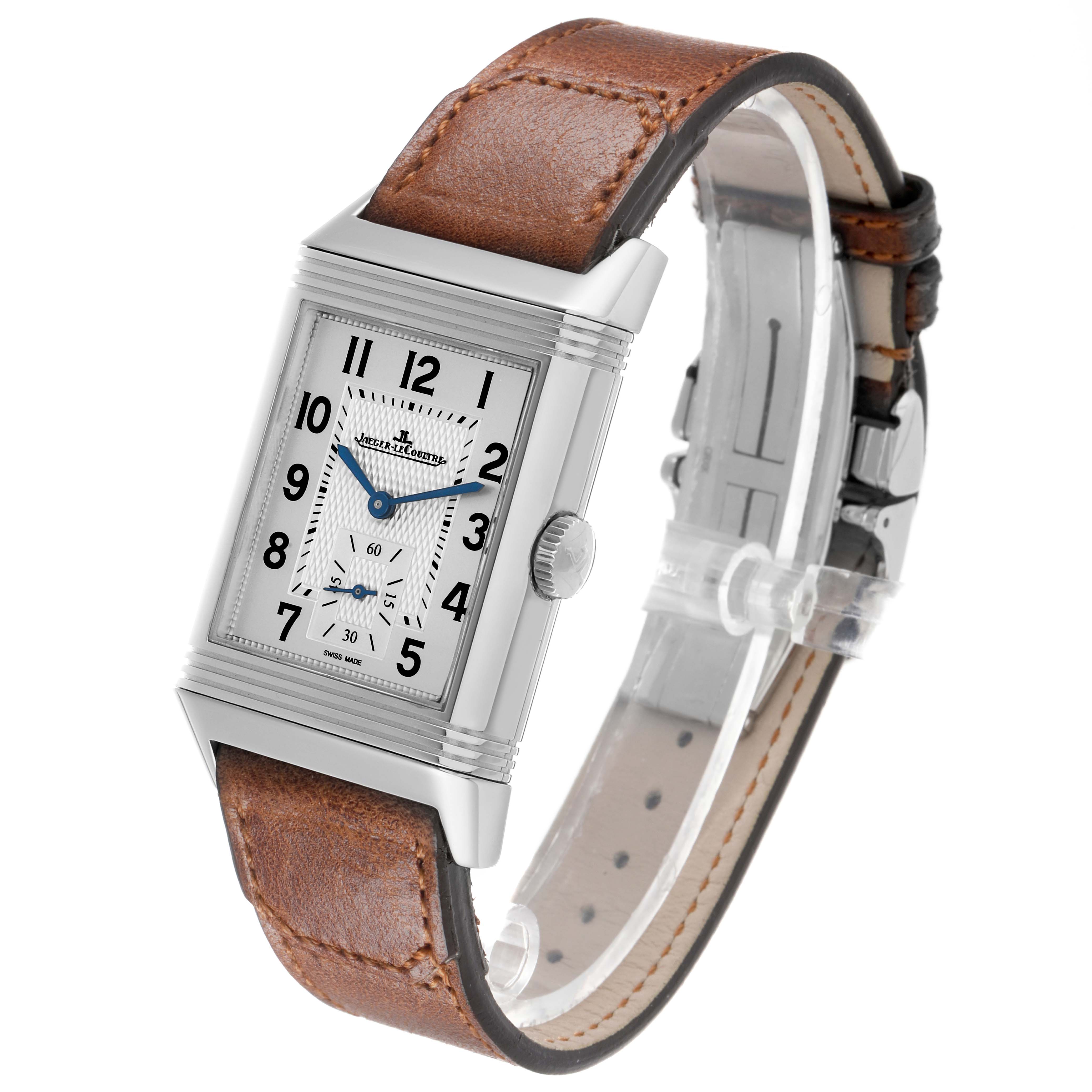 The Jaeger LeCoultre Reverso Q3848422 Men's Stainless Steel Silver Dial watch is shown at an angled side view highlighting its rectangular face, crown, and leather strap.