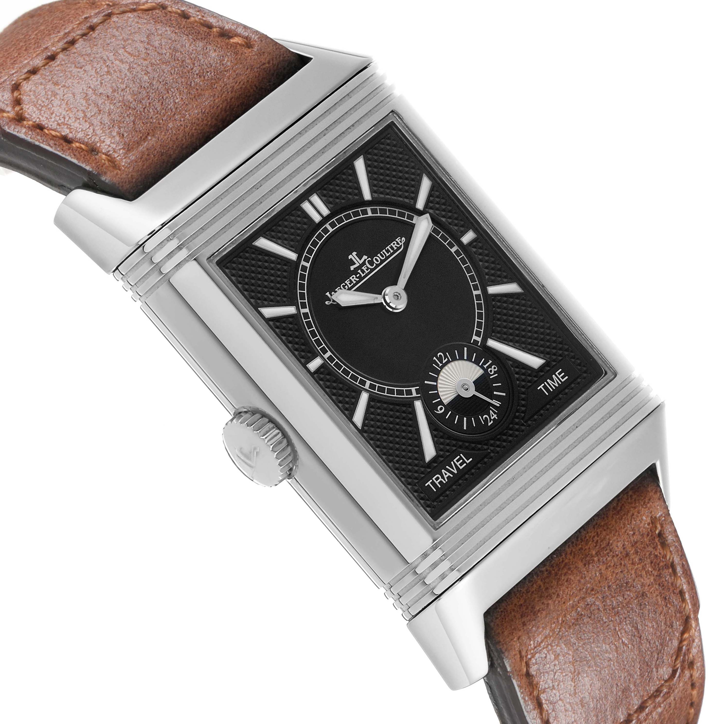The Jaeger-LeCoultre Reverso watch is shown at a side angle, highlighting the dial, crown, and a brown leather strap.