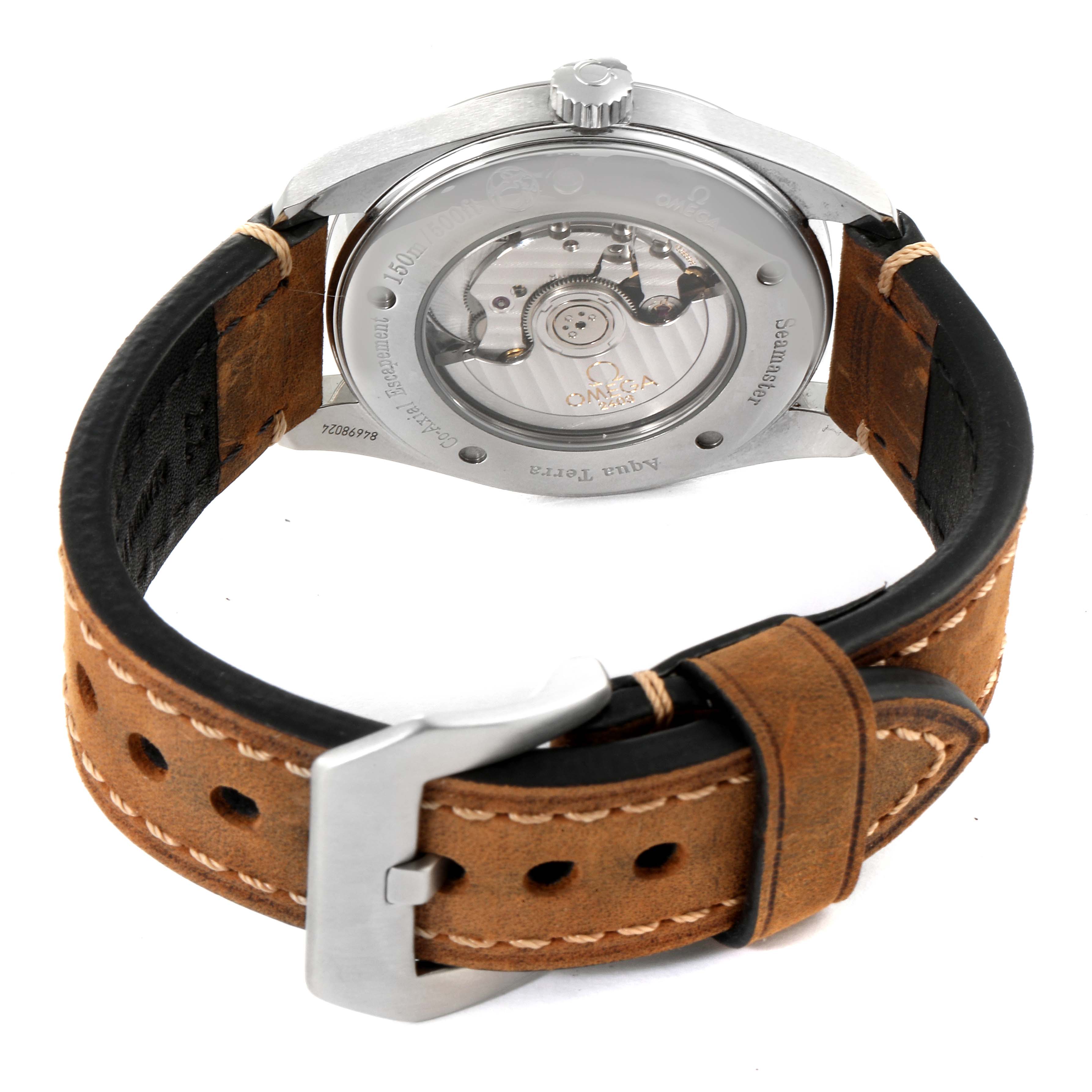 The image shows the back view of the Omega Aqua Terra 2502.52.00 Men's Stainless Steel Black Dial 2502.52.00 Men's Stainless Steel Black Dial watch, highlighting the movement through a transparent case back and the brown leather strap.