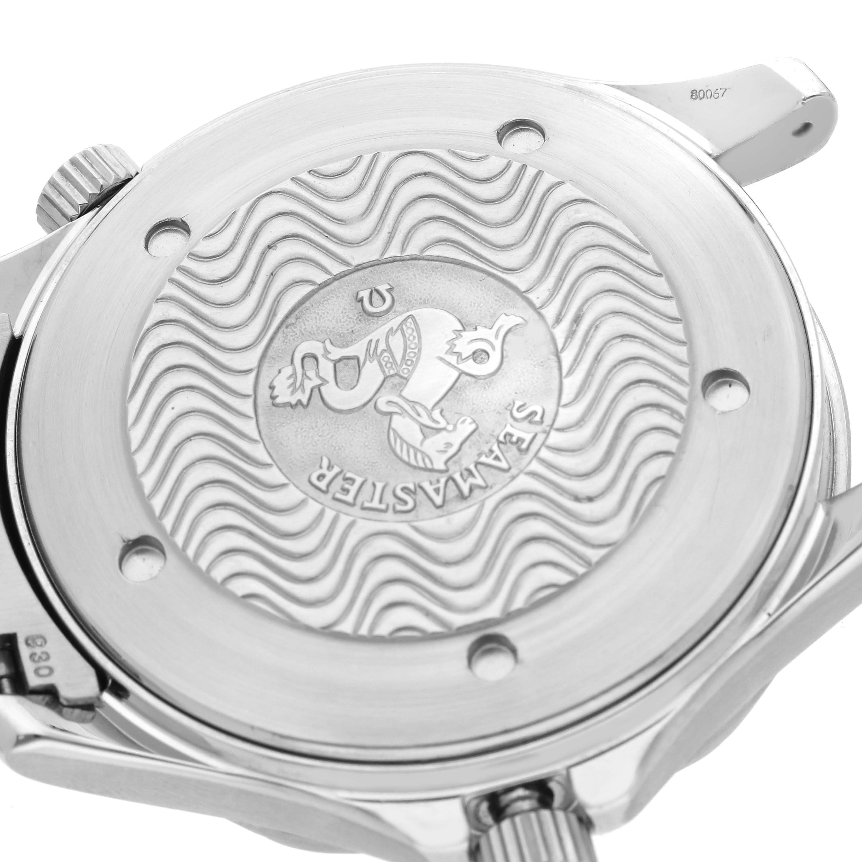 The image shows the case back of an Omega Seamaster 2255.80.00 Men
s Stainless Steel Blue Dial 2255.80.00 Men
s Stainless Steel Blue Dial watch, highlighting its engraved design and wavy pattern.