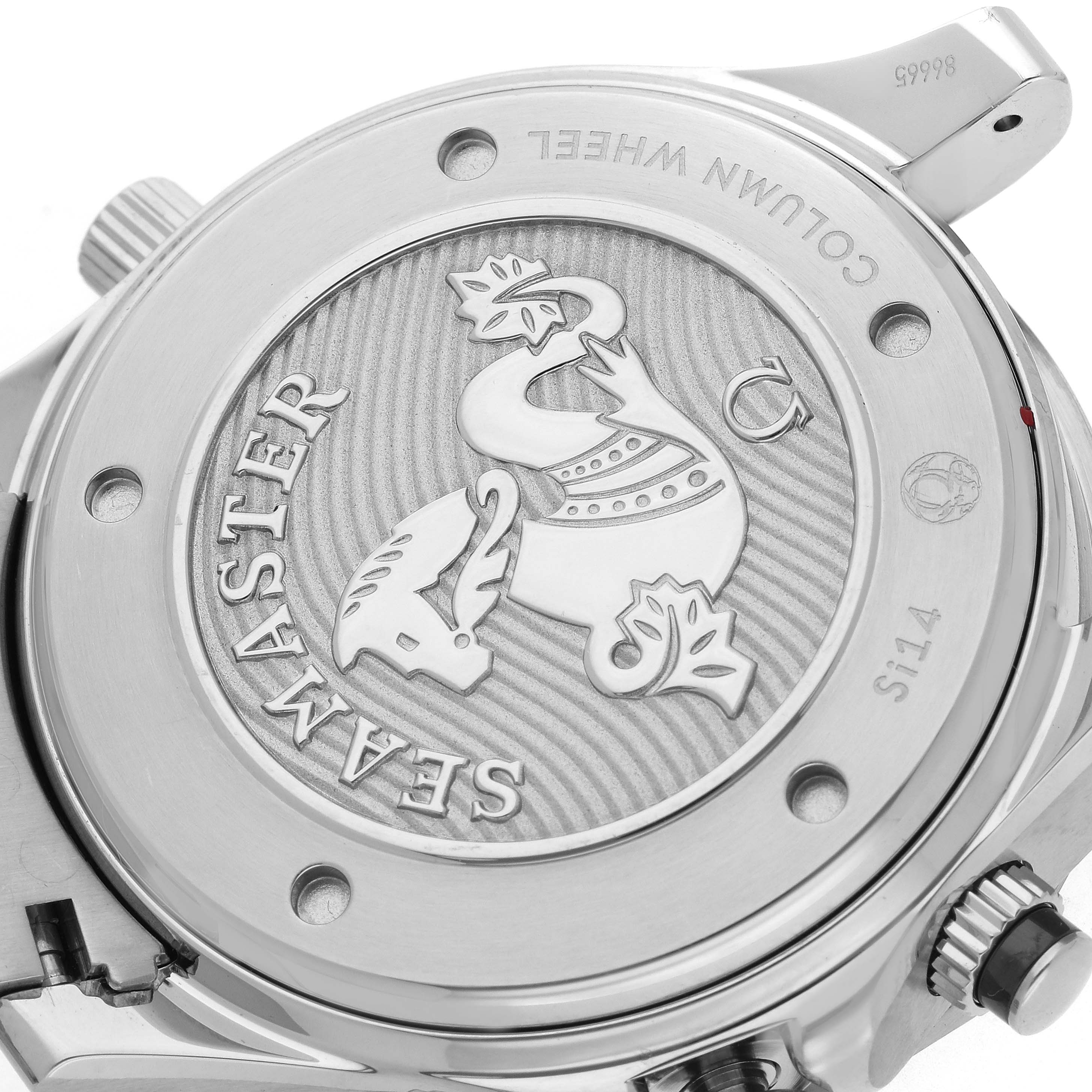 The image shows the case back of an Omega Seamaster 212.30.44.50.01.001 Men's Stainless Steel Black Dial watch with an engraved design and visible crown.