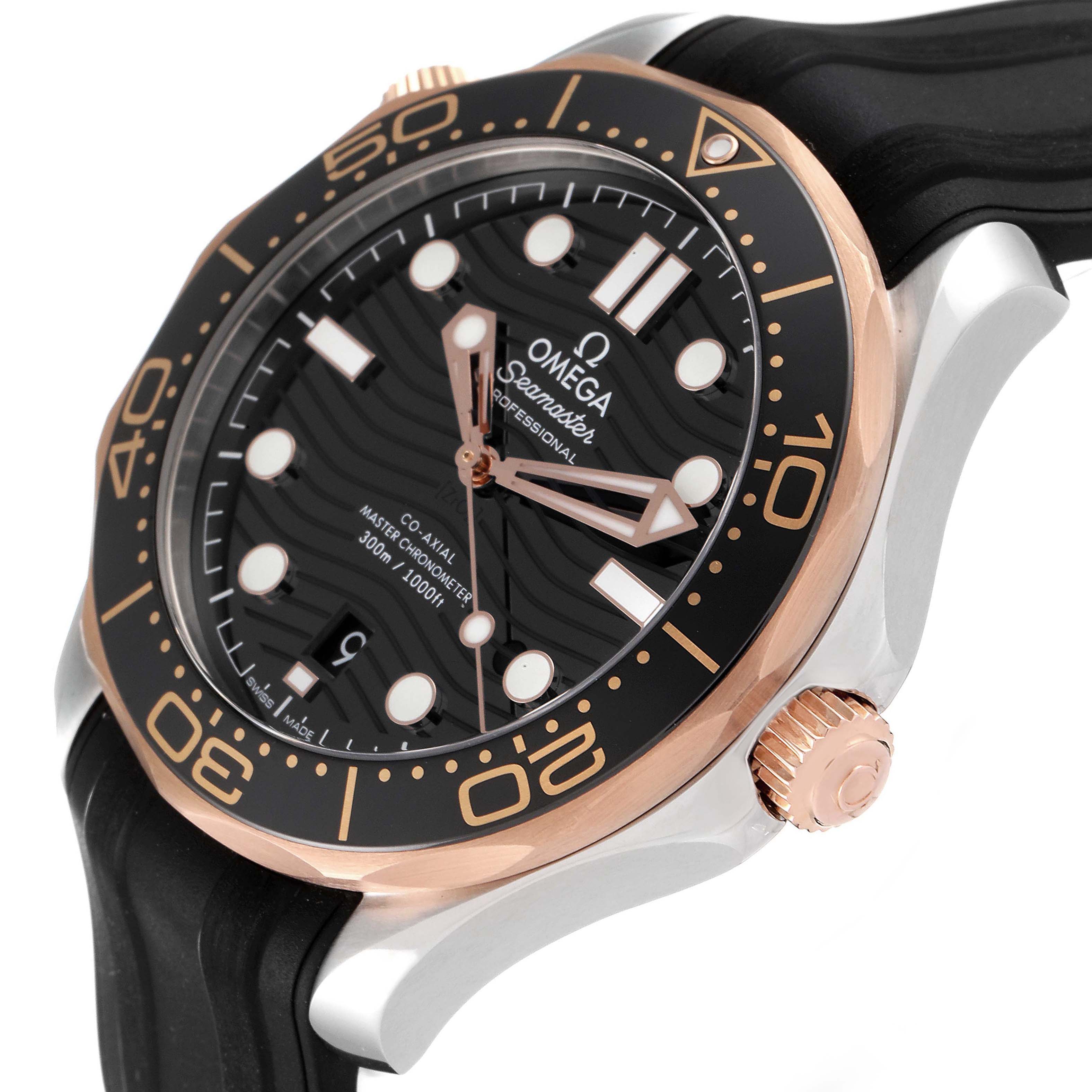 The image shows an Omega Seamaster 210.22.42.20.01.002 Men's Steel and Gold (two tone) Black Dial 210.22.42.20.01.002 Men's Steel and Gold (two tone) Black Dial watch at an angle highlighting its face, bezel, and part of the strap and crown.