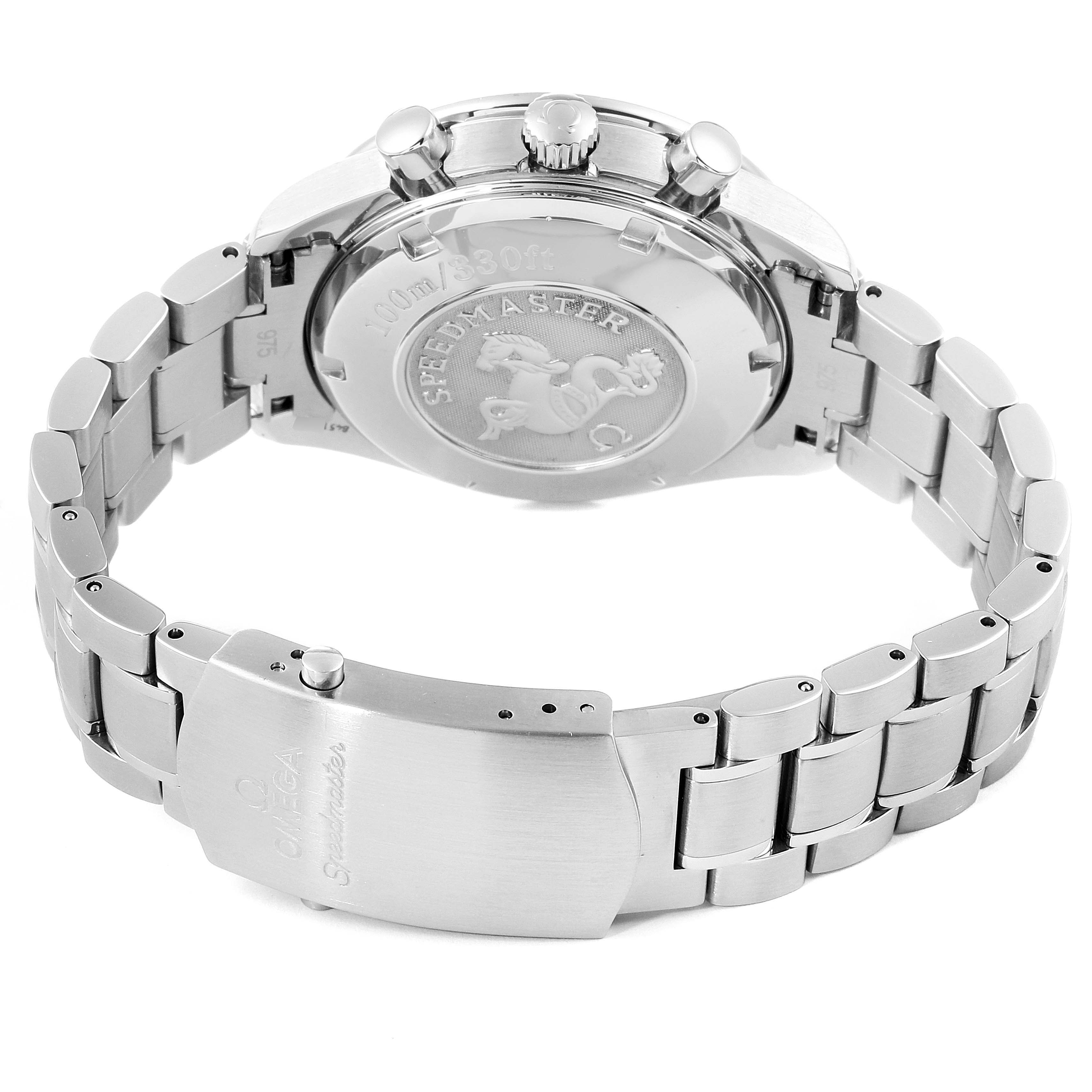 The image shows the backside and clasp of an Omega Speedmaster 3221.30.00 Men's Stainless Steel Silver Dial 3221.30.00 Men's Stainless Steel Silver Dial watch, highlighting the case back engravings and metal bracelet.