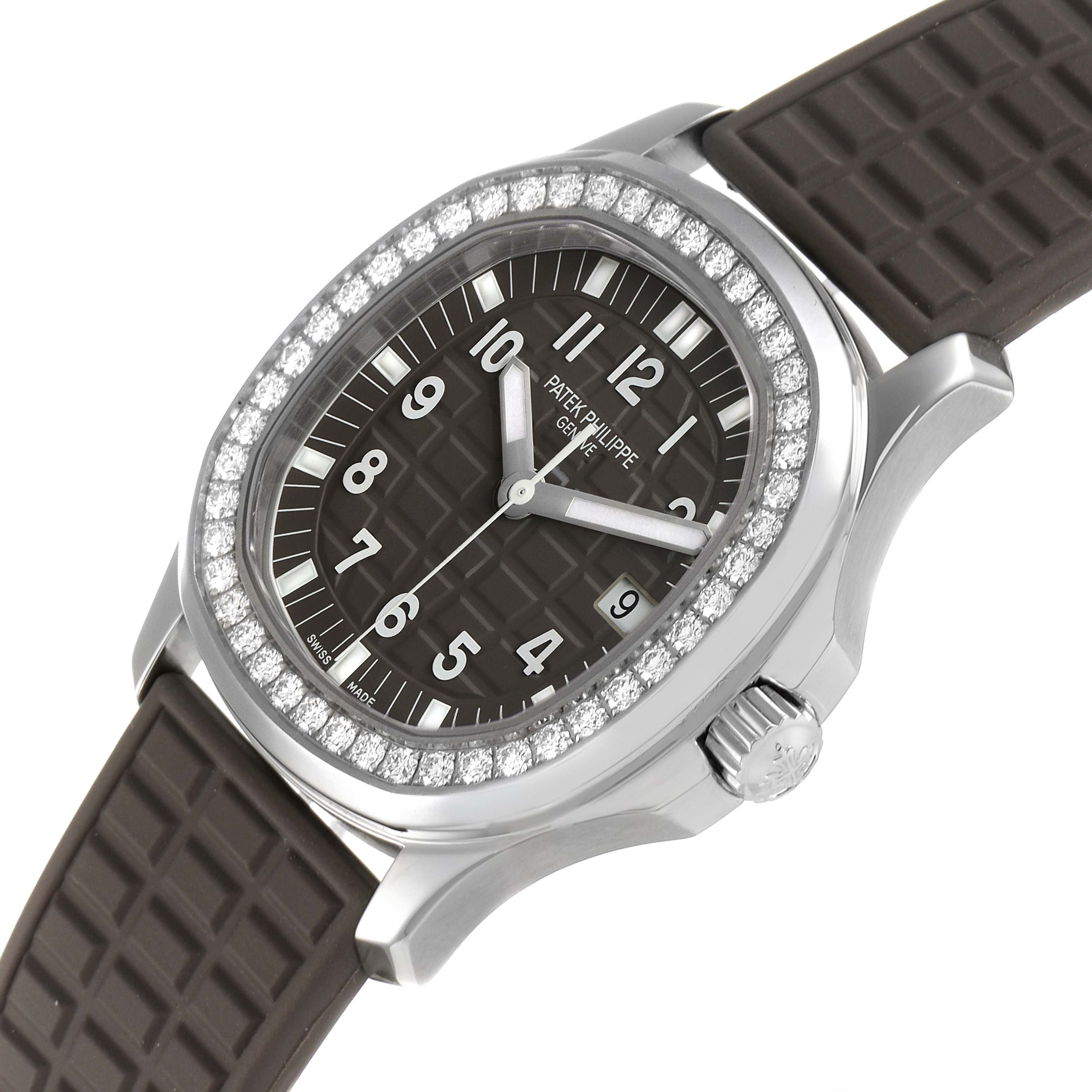 The image shows a Patek Philippe Aquanaut 5067A-023 Women's Stainless Steel Brown Dial 5067A-023 Women's Stainless Steel Brown Dial watch at a slight angle, featuring the dial, bezel with diamonds, and part of the strap.