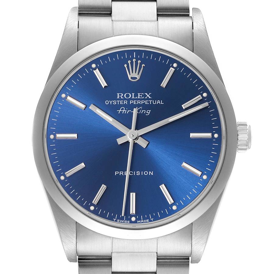 The Rolex Air-King is shown from the front, highlighting the blue dial, silver markers, and stainless steel bracelet.