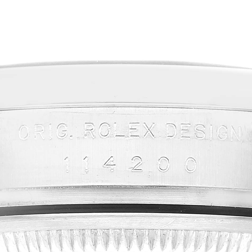 The image shows a close-up of the case side of a Rolex Air-King 114200 Men's Stainless Steel Blue Dial 114200 Men's Stainless Steel Blue Dial watch, displaying the engraved model number "114200."