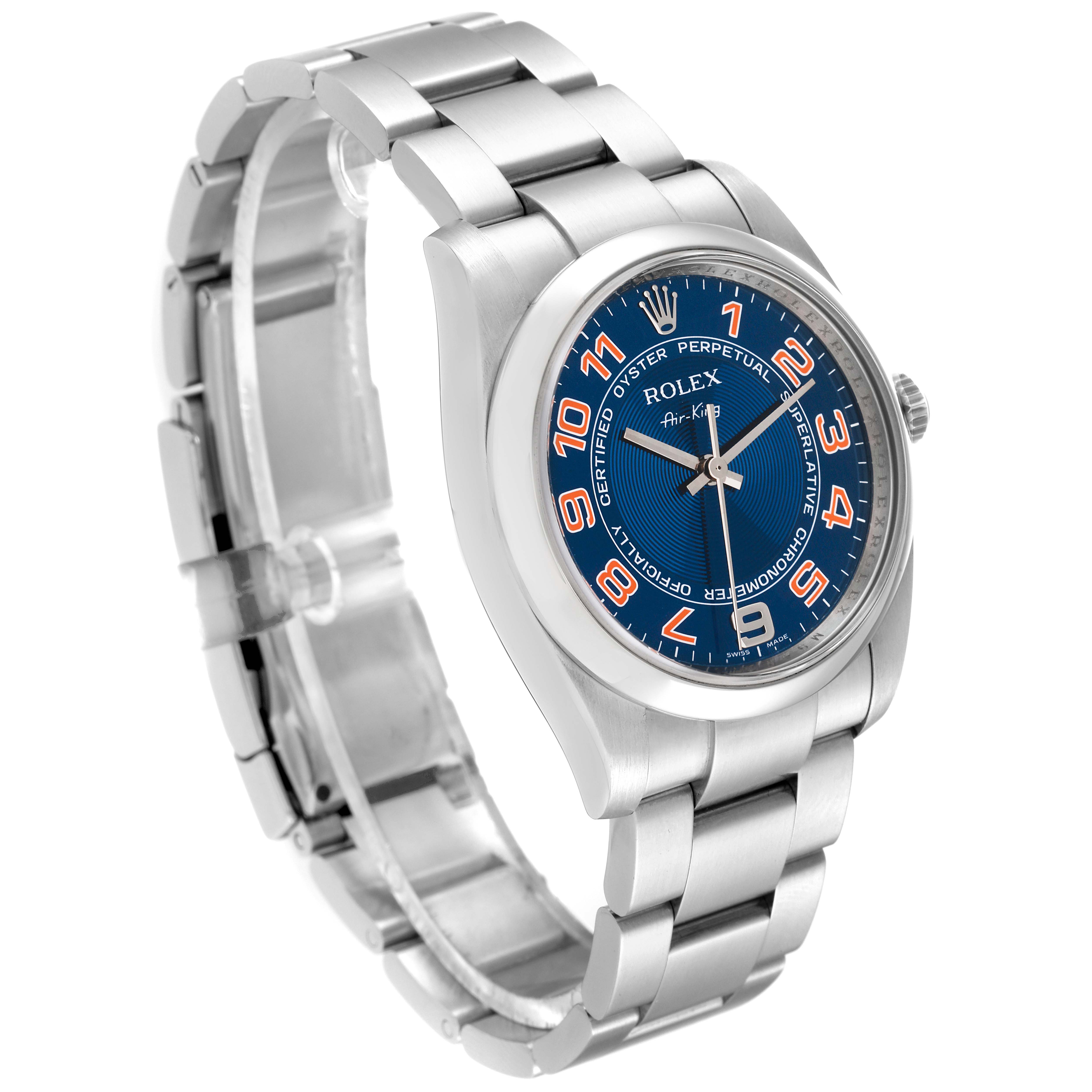 The Rolex Air-King 114200 Men's Stainless Steel Blue Dial 114200 Men's Stainless Steel Blue Dial watch is shown at a three-quarter angle, highlighting its stainless steel band and blue dial with orange numerals.