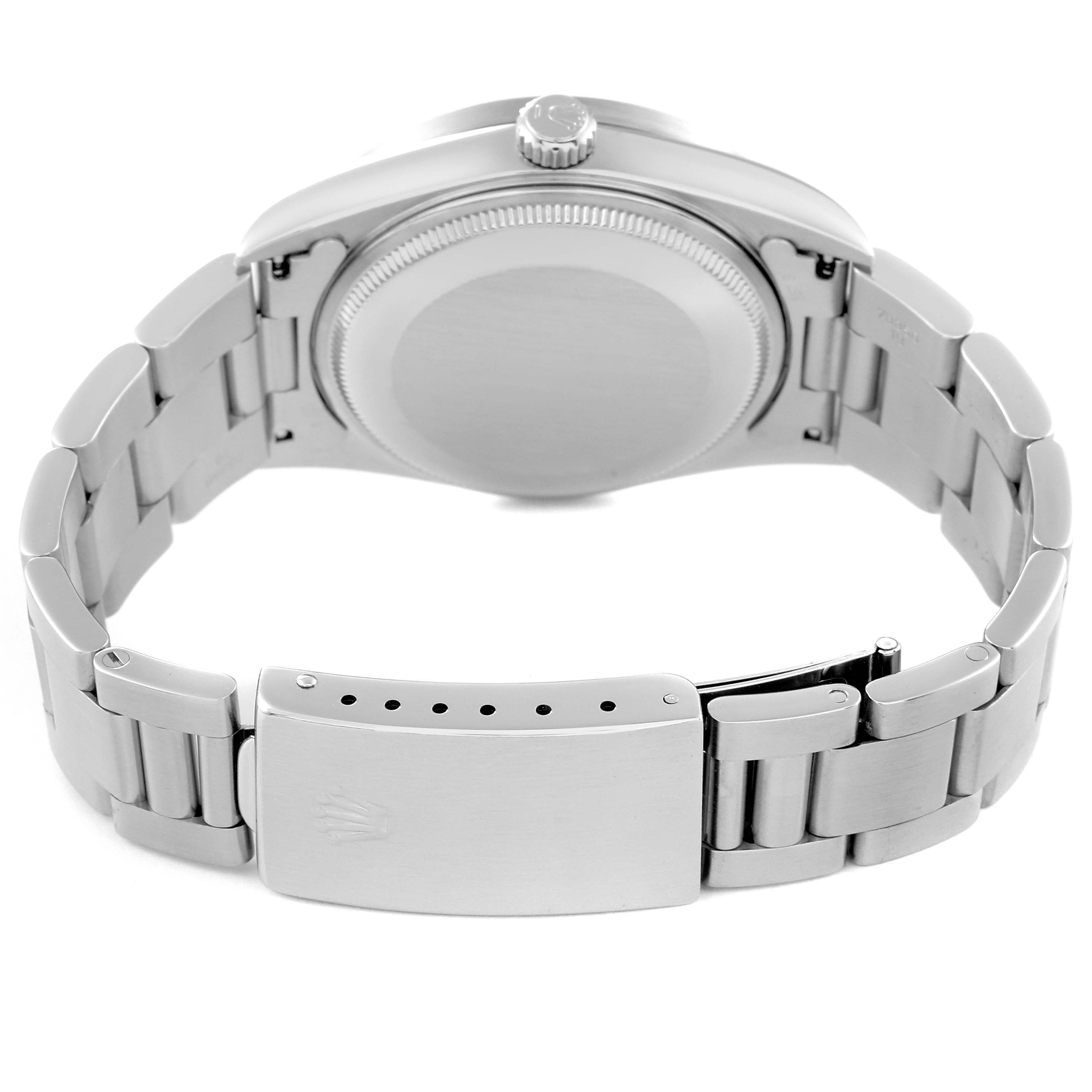 This image shows the back of the Rolex Air-King 14010 Men's Stainless Steel Black Dial 14010 Men's Stainless Steel Black Dial watch, including the case back and bracelet with the clasp.