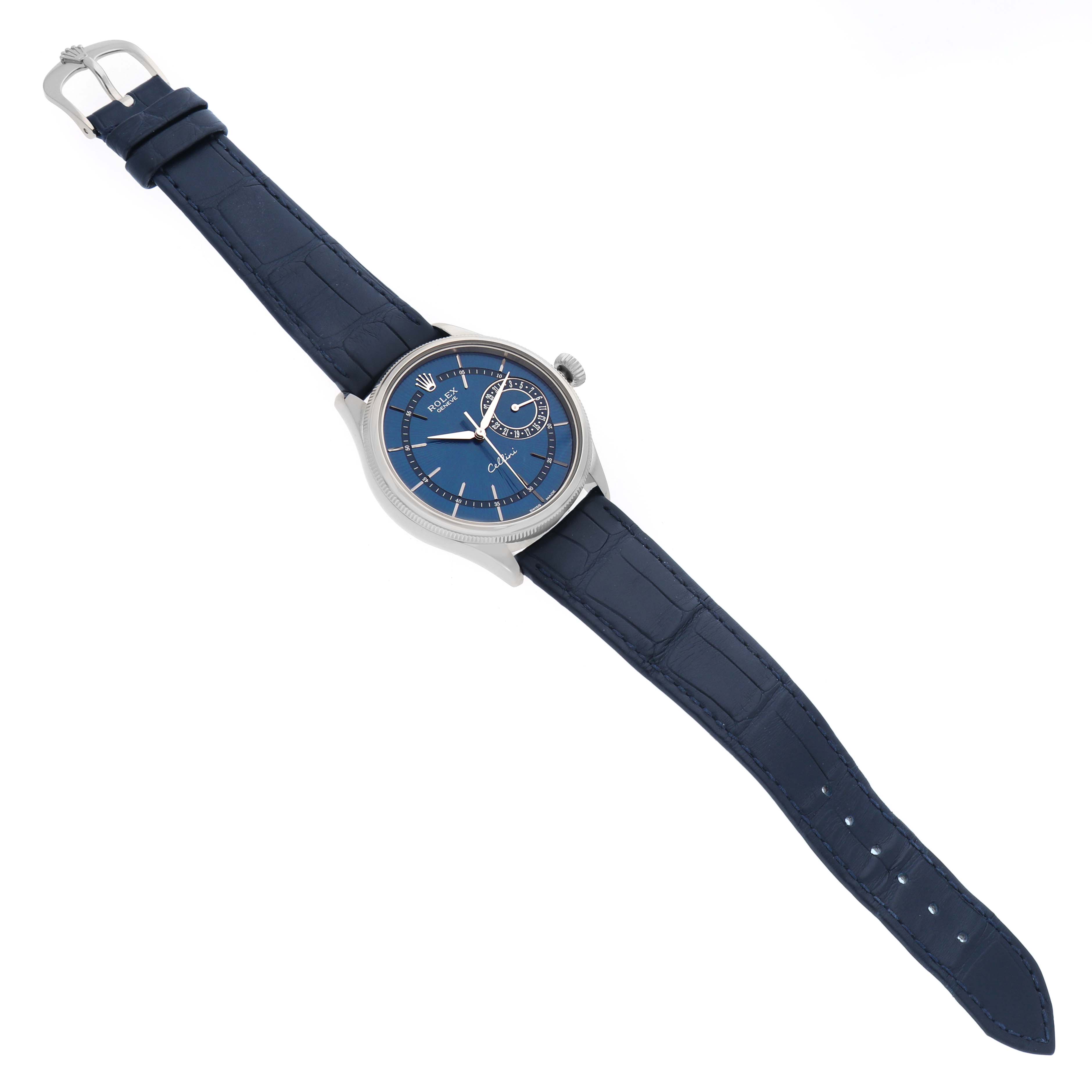 The Rolex Cellini 50519 Men's White Gold Blue Dial watch is shown at a three-quarter angle, displaying the face, crown, and blue leather strap.