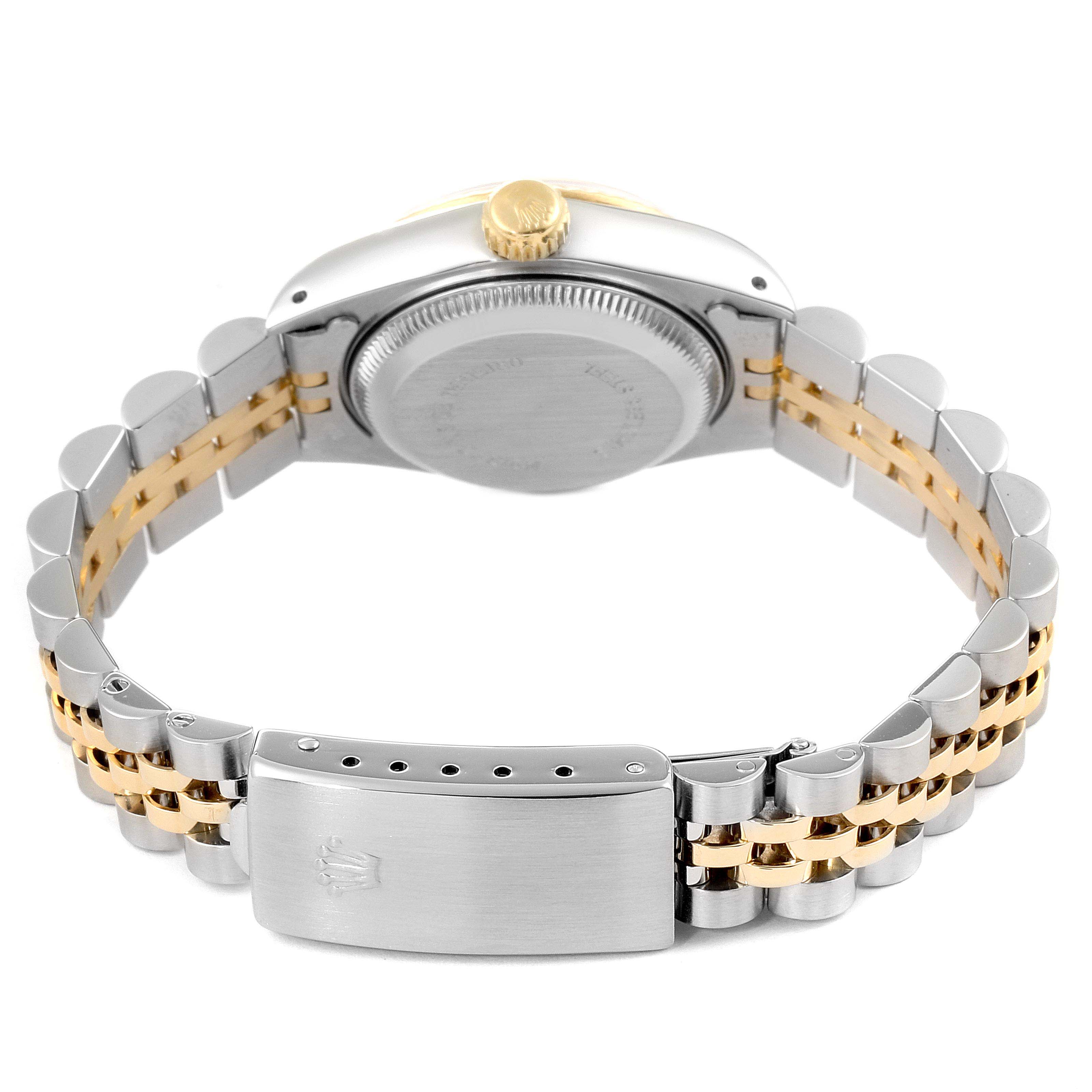The image shows the back view of a Rolex Datejust 69173 Women
s Steel and Gold (two tone) Champagne Dial 69173 Women
s Steel and Gold (two tone) Champagne Dial watch, highlighting the case back, crown, and two-tone bracelet with clasp.
