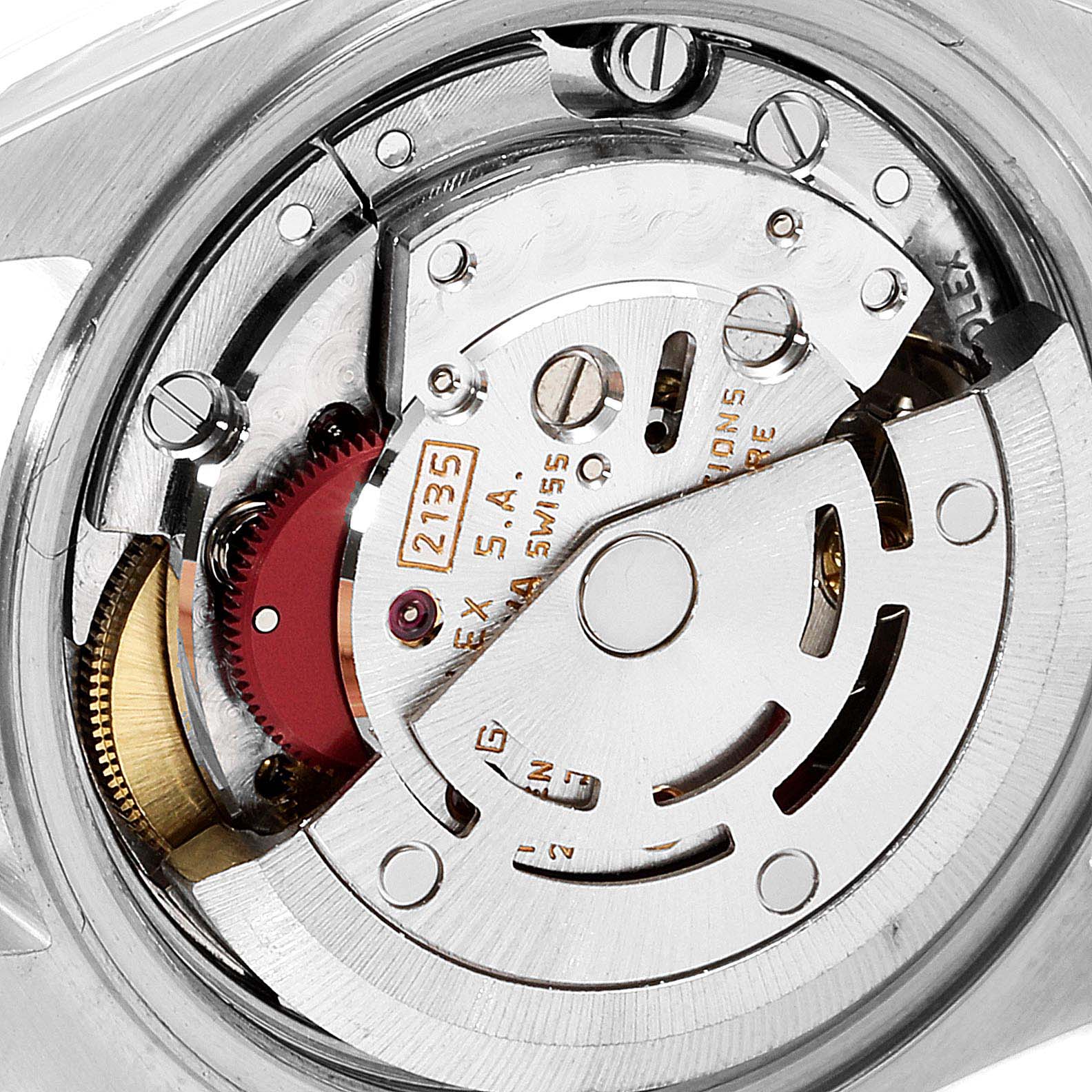 The image shows a close-up of the Rolex Datejust 69173 Women
s Steel and Gold (two tone) Champagne Dial 69173 Women
s Steel and Gold (two tone) Champagne Dial watch model
s movement mechanism from the back.