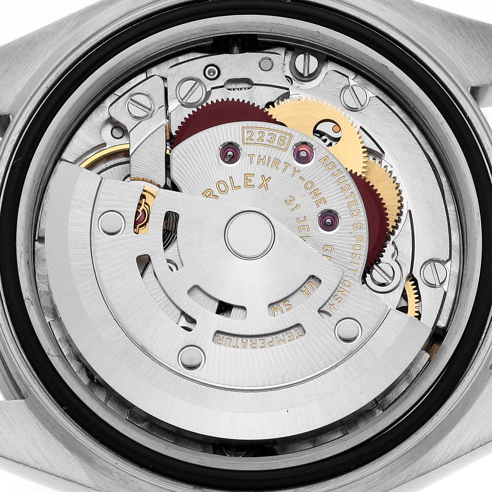 The image shows the movement mechanism of a Rolex Datejust 279160 Women's Stainless Steel Grey Dial 279160 Women's Stainless Steel Grey Dial watch from a back angle, highlighting gears and the rotor.