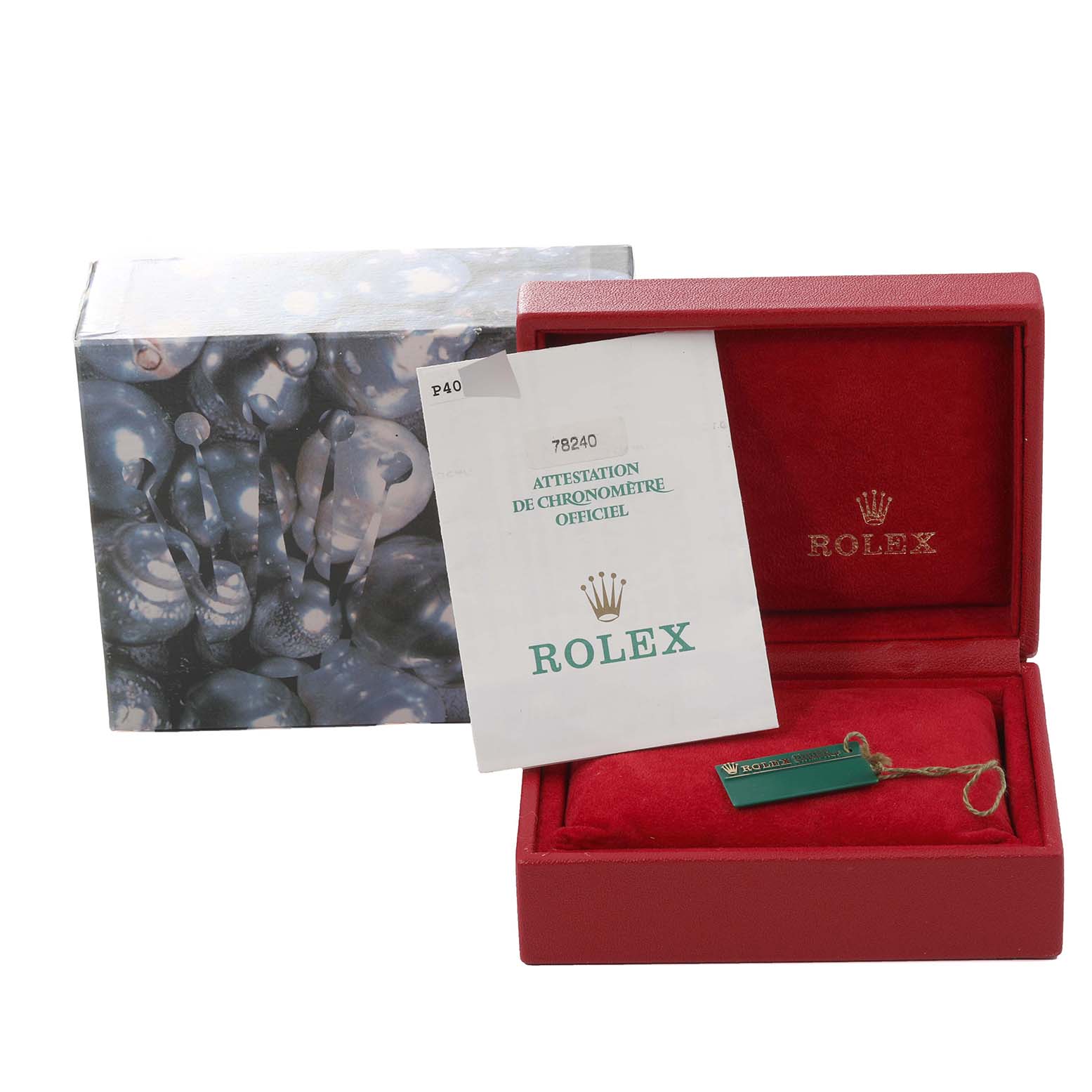 This image shows a Mid-Size Rolex watch box, official chronometer certification, and a tag, viewed from the front.