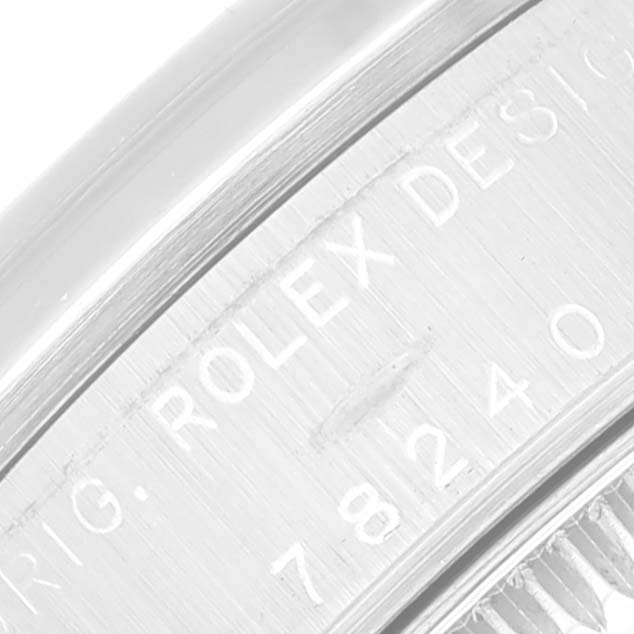 This is a close-up image of the case back showing the engravings on a Mid-Size Rolex watch.
