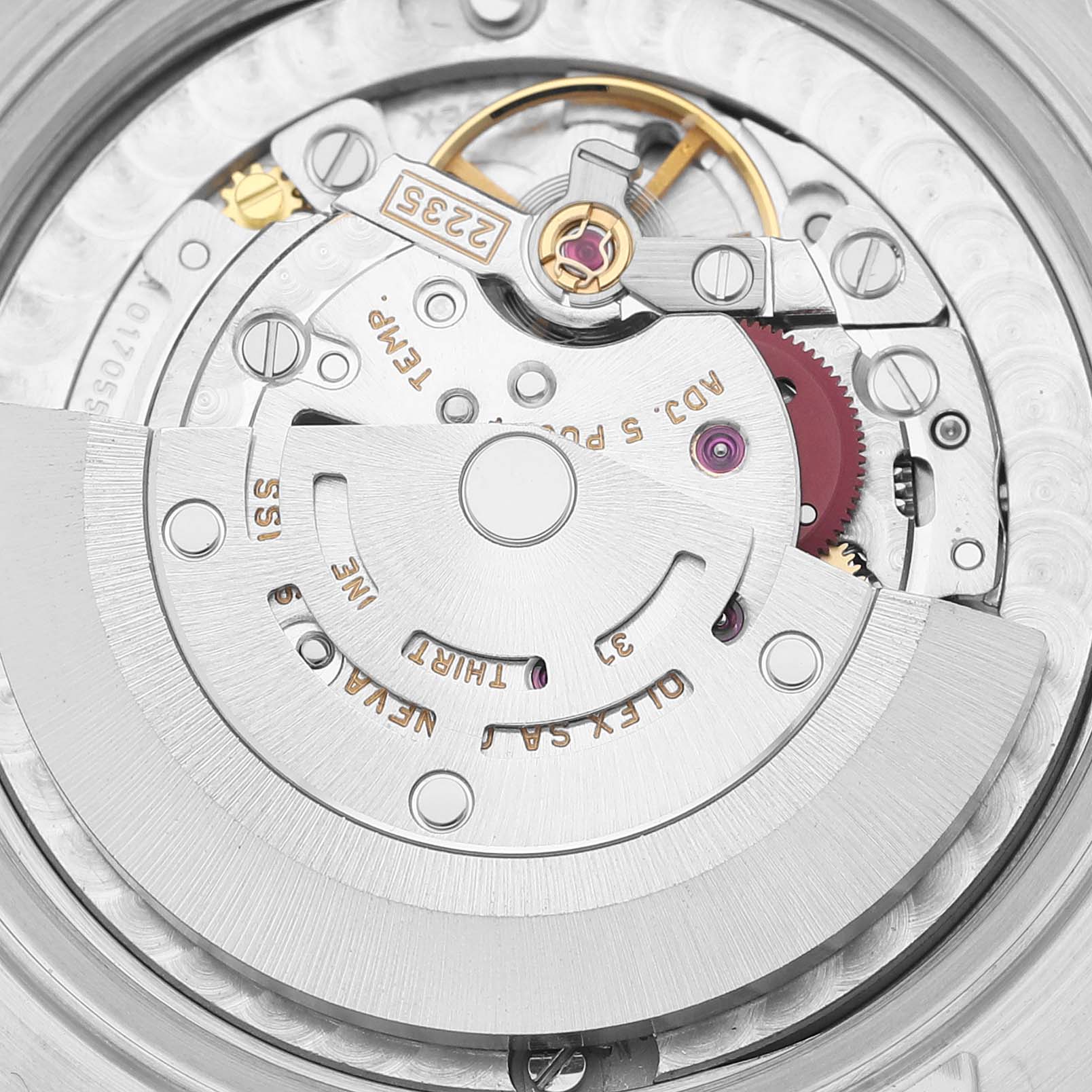 This image shows a close-up view of the movement components of a Rolex Mid-Size 78240 Women's Stainless Steel Pink Dial 78240 Women's Stainless Steel Pink Dial model watch, highlighting the intricate mechanics.