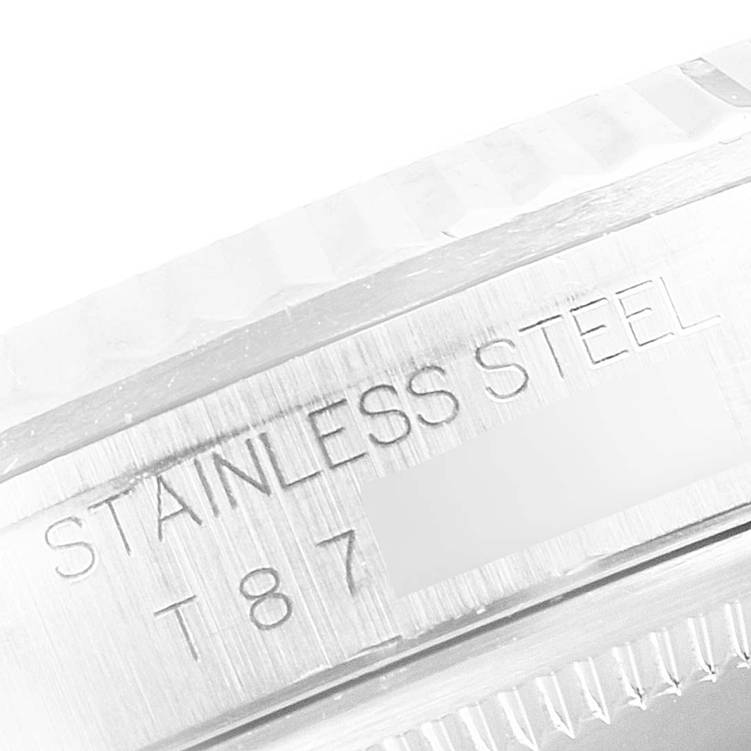 The image shows a close-up of the casing side of a Rolex Datejust 16234 Men's Stainless Steel White Dial 16234 Men's Stainless Steel White Dial model, specifically highlighting the stainless steel marking.