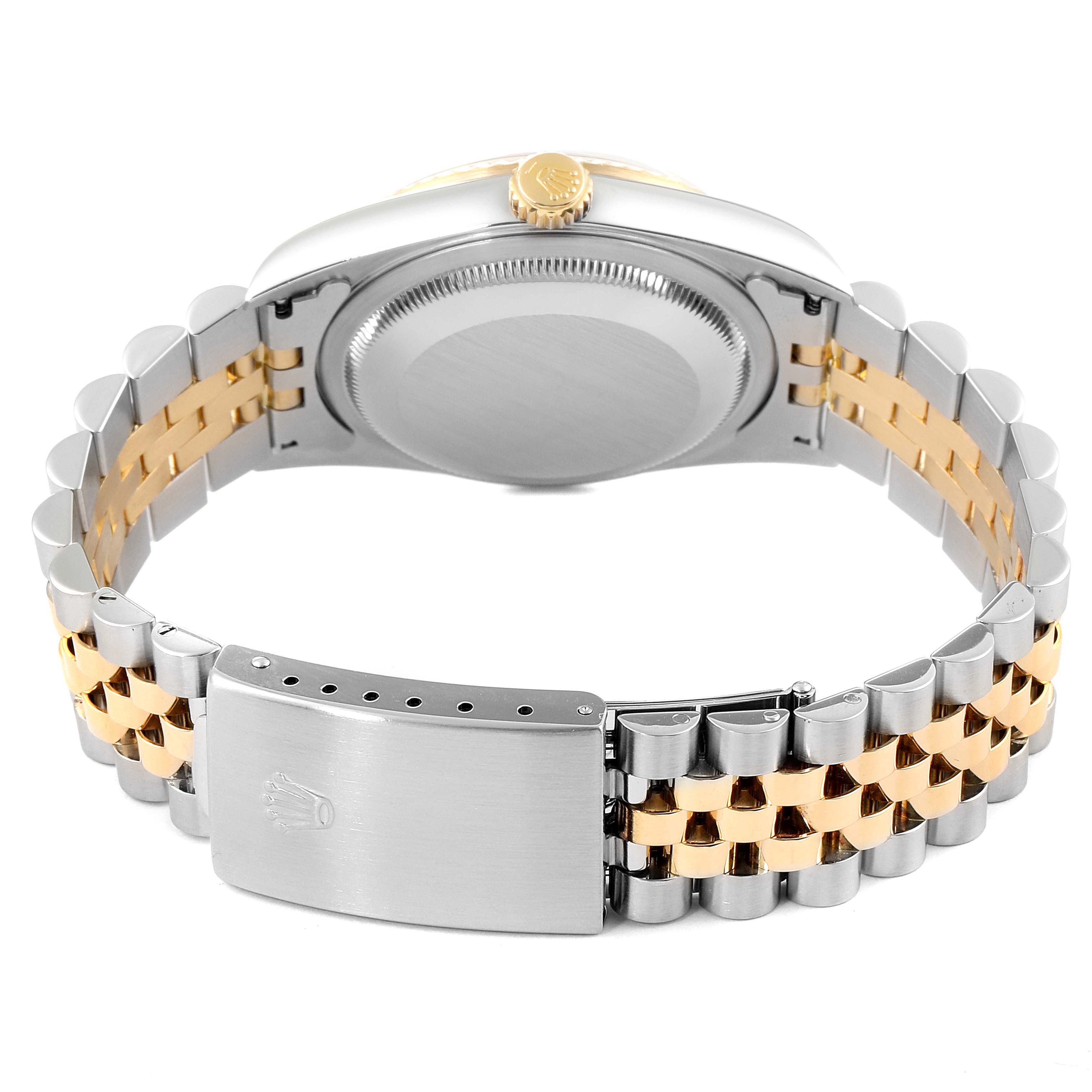 The image shows the back view of a Rolex Datejust 16233 Men's Steel and Gold (two tone) Champagne Dial 16233 Men's Steel and Gold (two tone) Champagne Dial watch, highlighting its case back and two-tone bracelet.