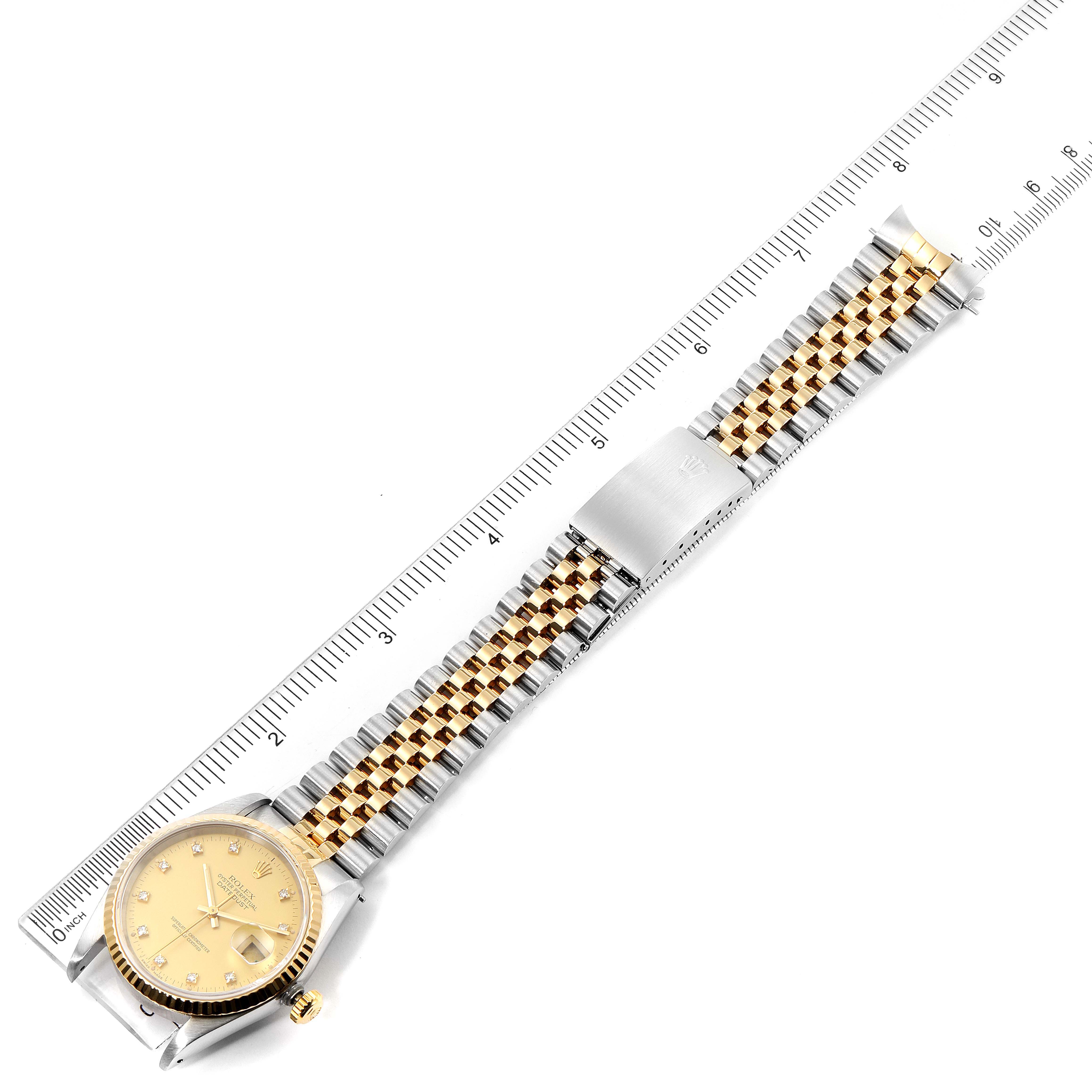 The image shows a top-down view of a Rolex Datejust 16233 Men's Steel and Gold (two tone) Champagne Dial 16233 Men's Steel and Gold (two tone) Champagne Dial watch, displaying the full watch, including the face, bezel, and bracelet.