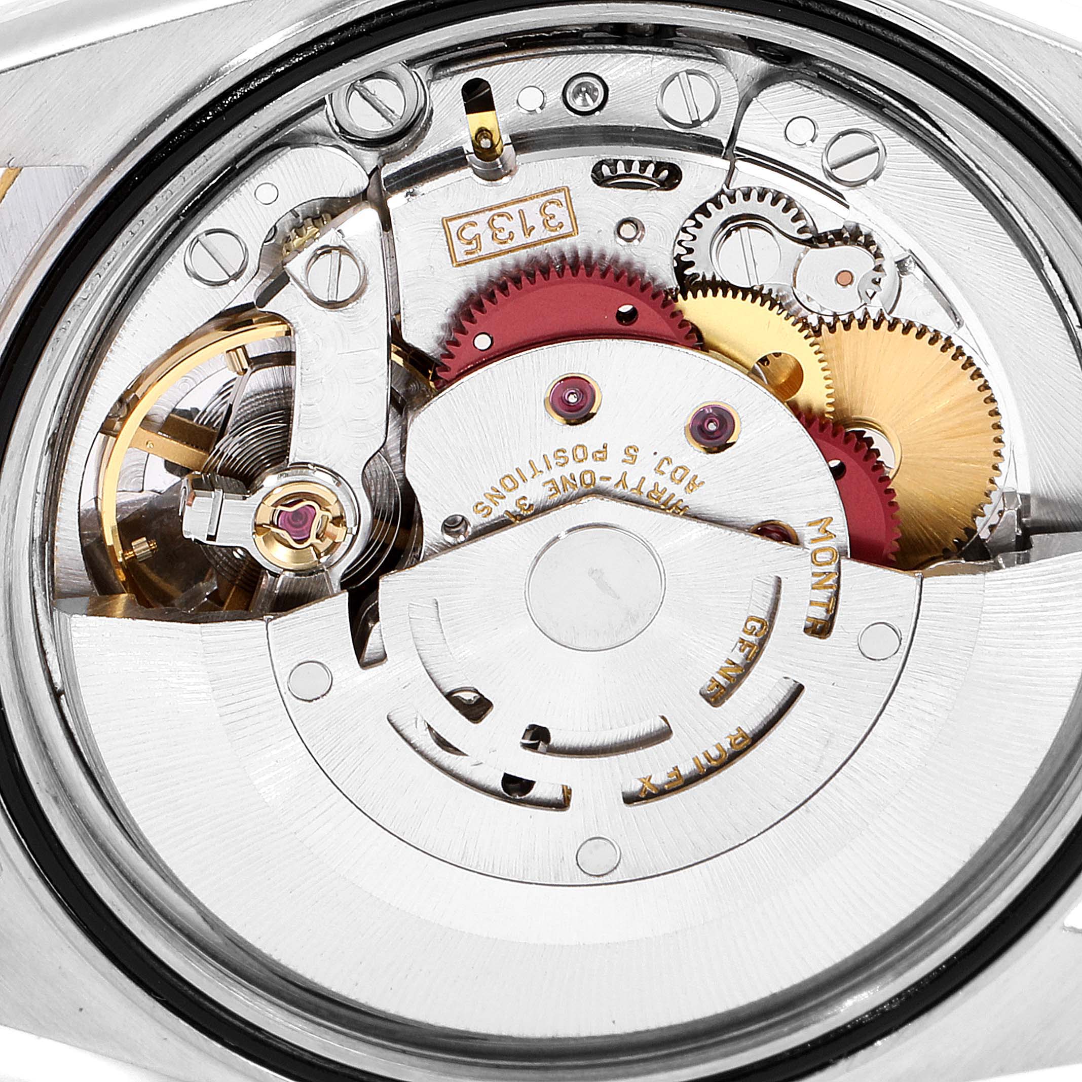 The image shows a close-up view of the inside movement mechanism of a Rolex Datejust 16233 Men's Steel and Gold (two tone) Champagne Dial 16233 Men's Steel and Gold (two tone) Champagne Dial watch.