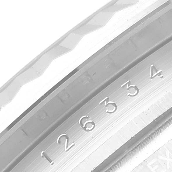 This close-up image shows the detailed engraving on the bezel of a Rolex Datejust 41 126334 Men
s Stainless Steel Black Dial 126334 Men
s Stainless Steel Black Dial watch.
